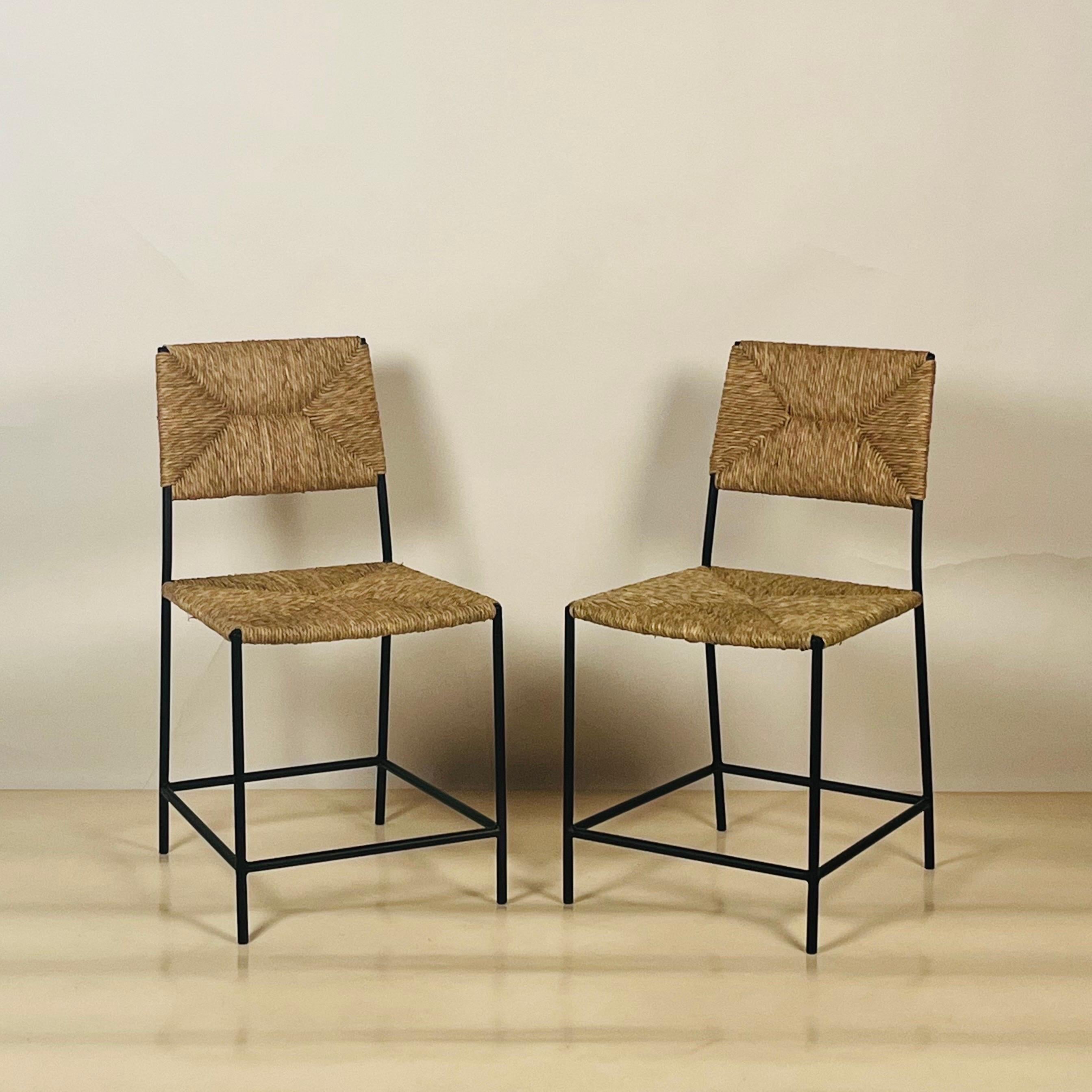 Pair of 'Campagne' chairs by Design Frères.

18 1/2 seat height. Discrete non-scratch gliders on the tips of the legs (picture before last).

Sturdy and comfortable. Chic and understated.