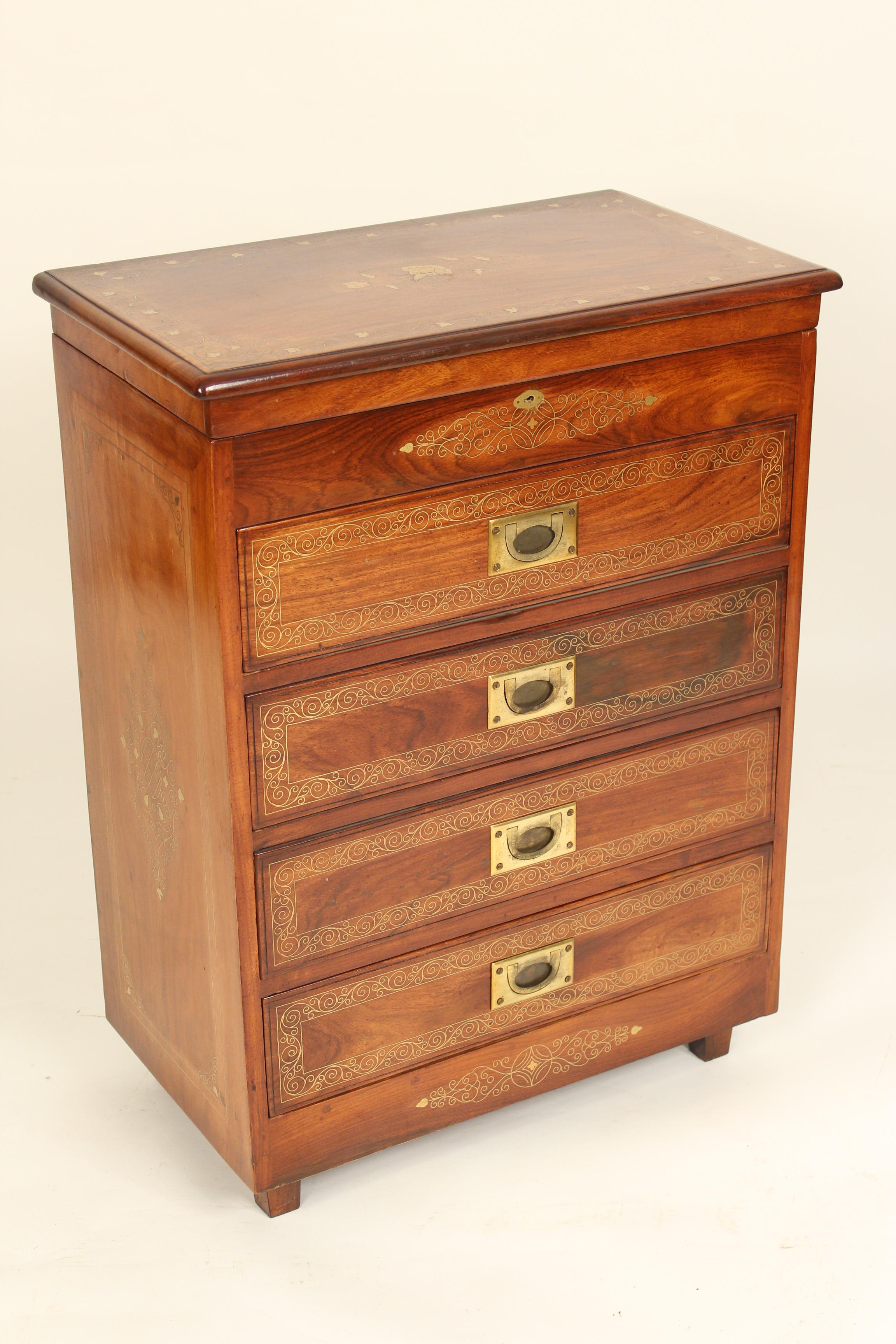 Pair of Campaign style rosewood chests of drawers with brass inlay, approximately 30 years old. Great workmanship on these chests of drawers with intricate brass inlay. The tops lift up on both chests of drawers. There are 2 depths for these chests,