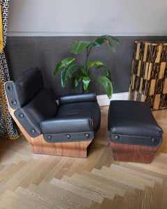 Pair of Canada Armchairs P119 with footrest in black leather