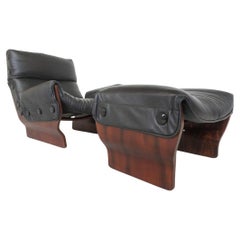 Pair of Canada Armchairs P119 with footrest in black leather