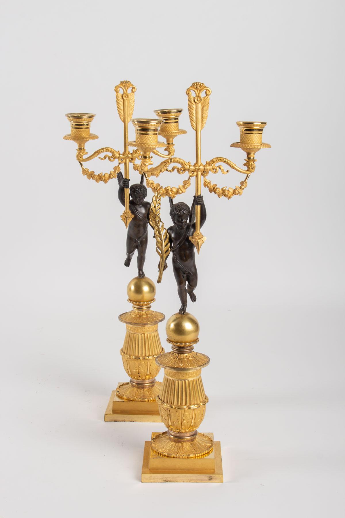 Pair of candelabra in gilt bronze and patinated, 19th century, Miss A bobeche
Measures: H 46cm, W 17cm, W 14cm.