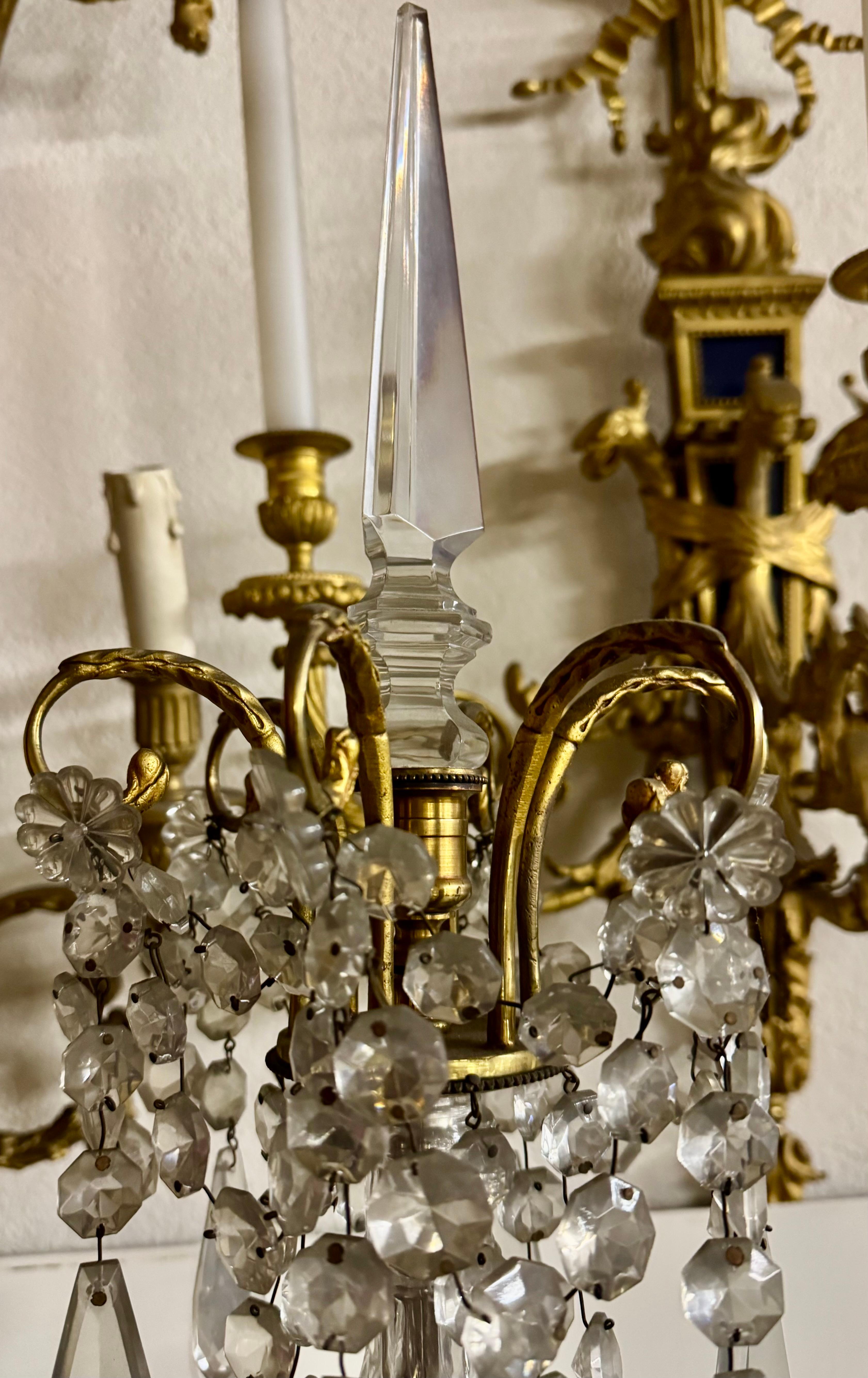 Important pair of  candelabras girandoles bronze and crystal  louis XVI style
with six lights Very rare they end on the top by a crystal dagger which give a rare elegance

