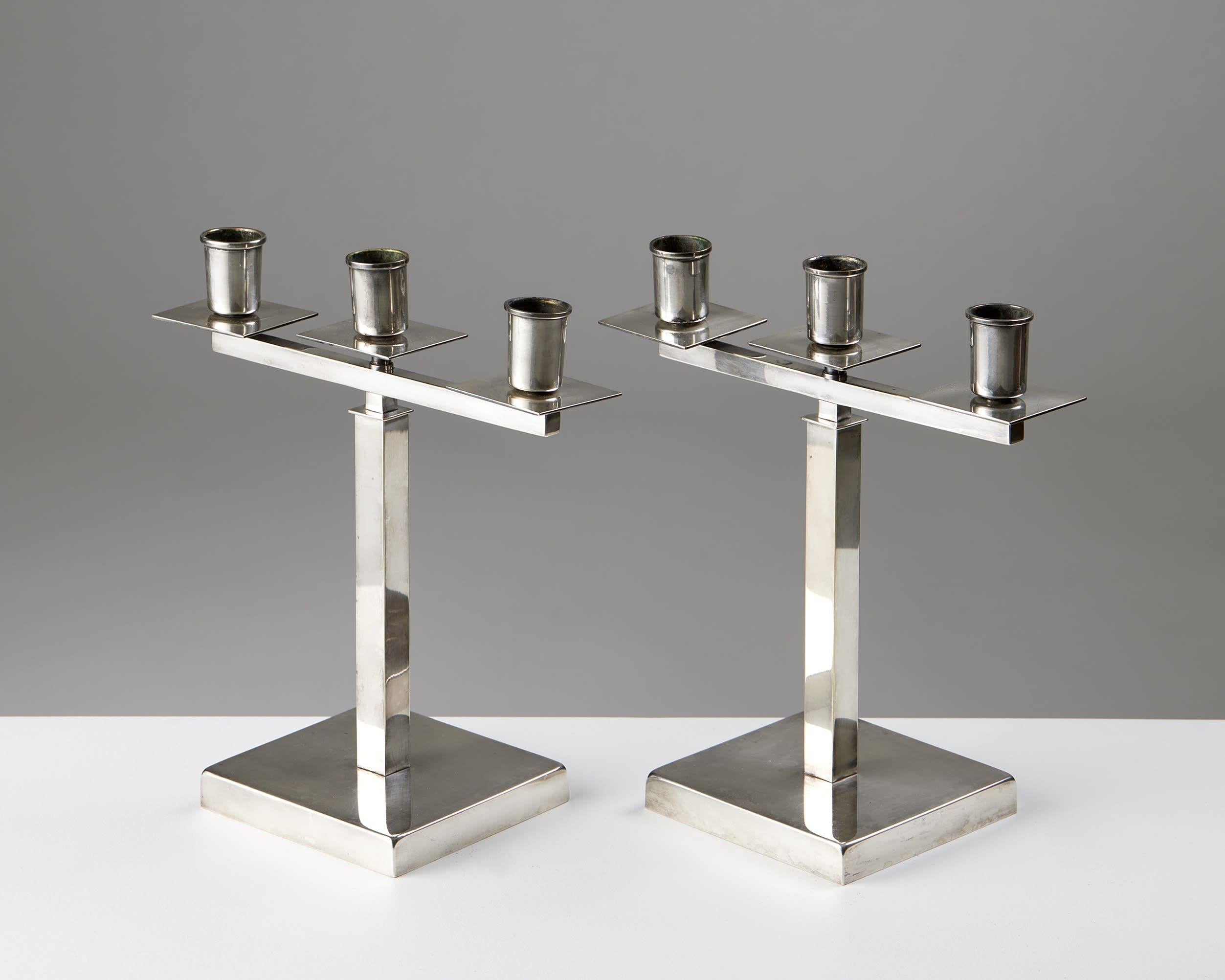 Swedish Pair of candelabras designed by Rolf Engströmer, Fabriksaktiebolaget Kronsilver