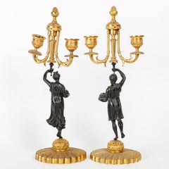 Pair of Candelabras in Patinated and Gilded Bronze, Charles X Period.