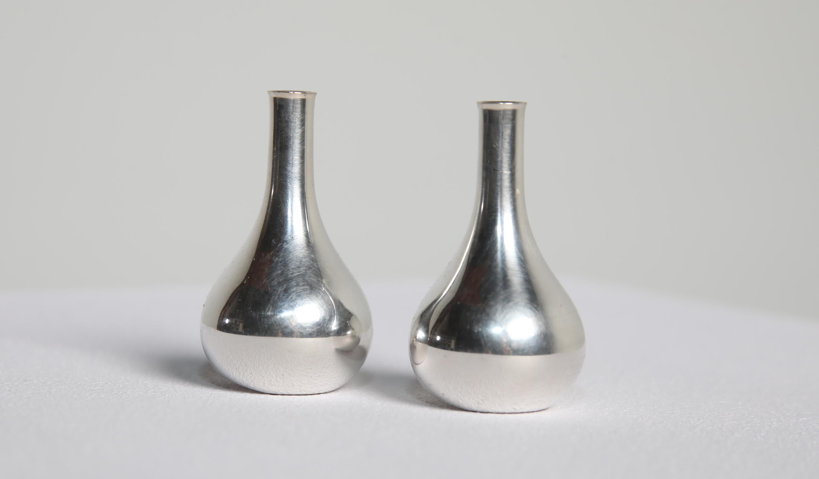 A pair of sculptural candleholders designed by Jens Harald Quistgaard for Dansk Designs, Denmark. Executed in cast metal with a refined, weighty form, these pieces exemplify Quistgaard’s ability to merge functional design with a distinct sculptural