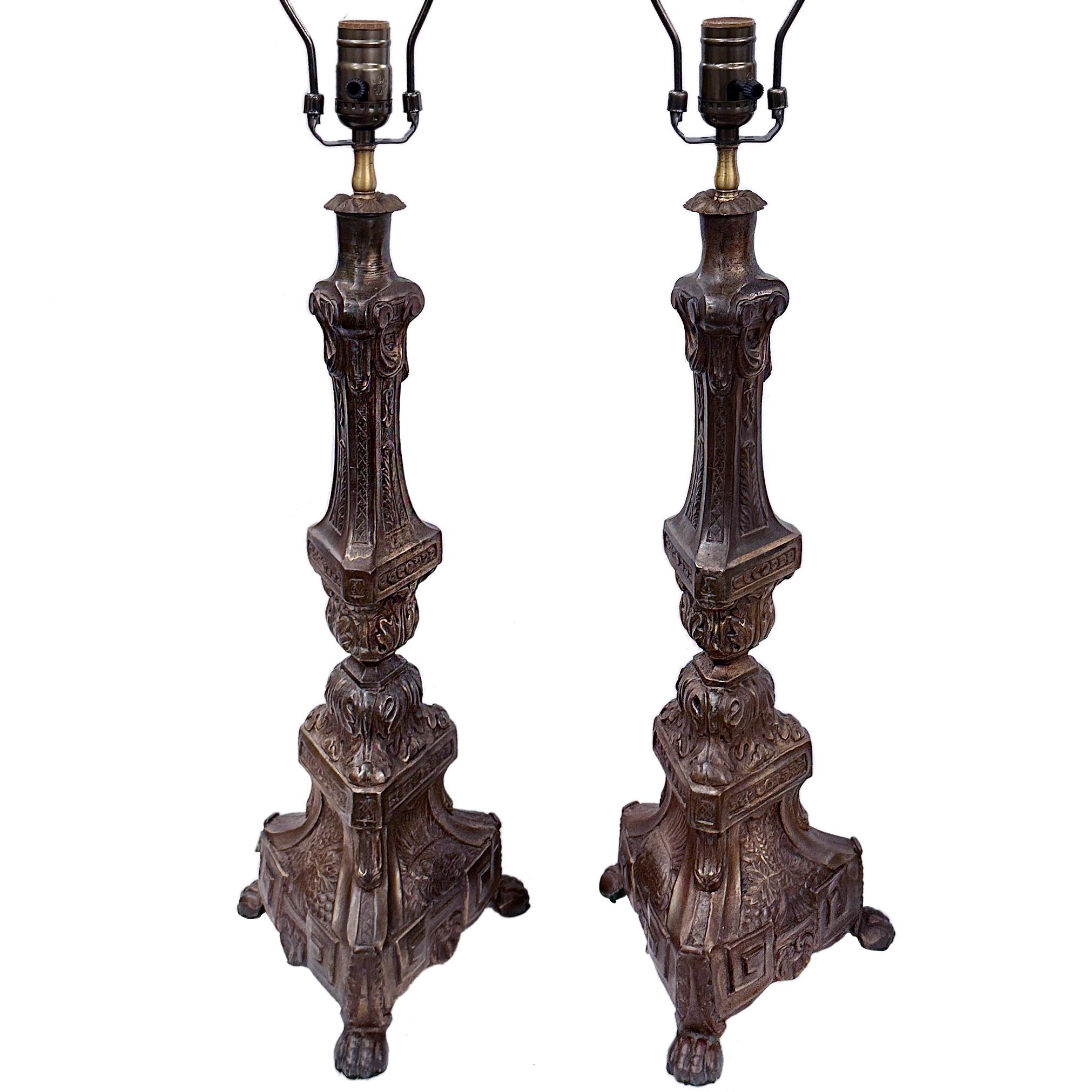 Pair of 1920's Italian brass candlestick lamps.

Measurements:
Height of body: 23