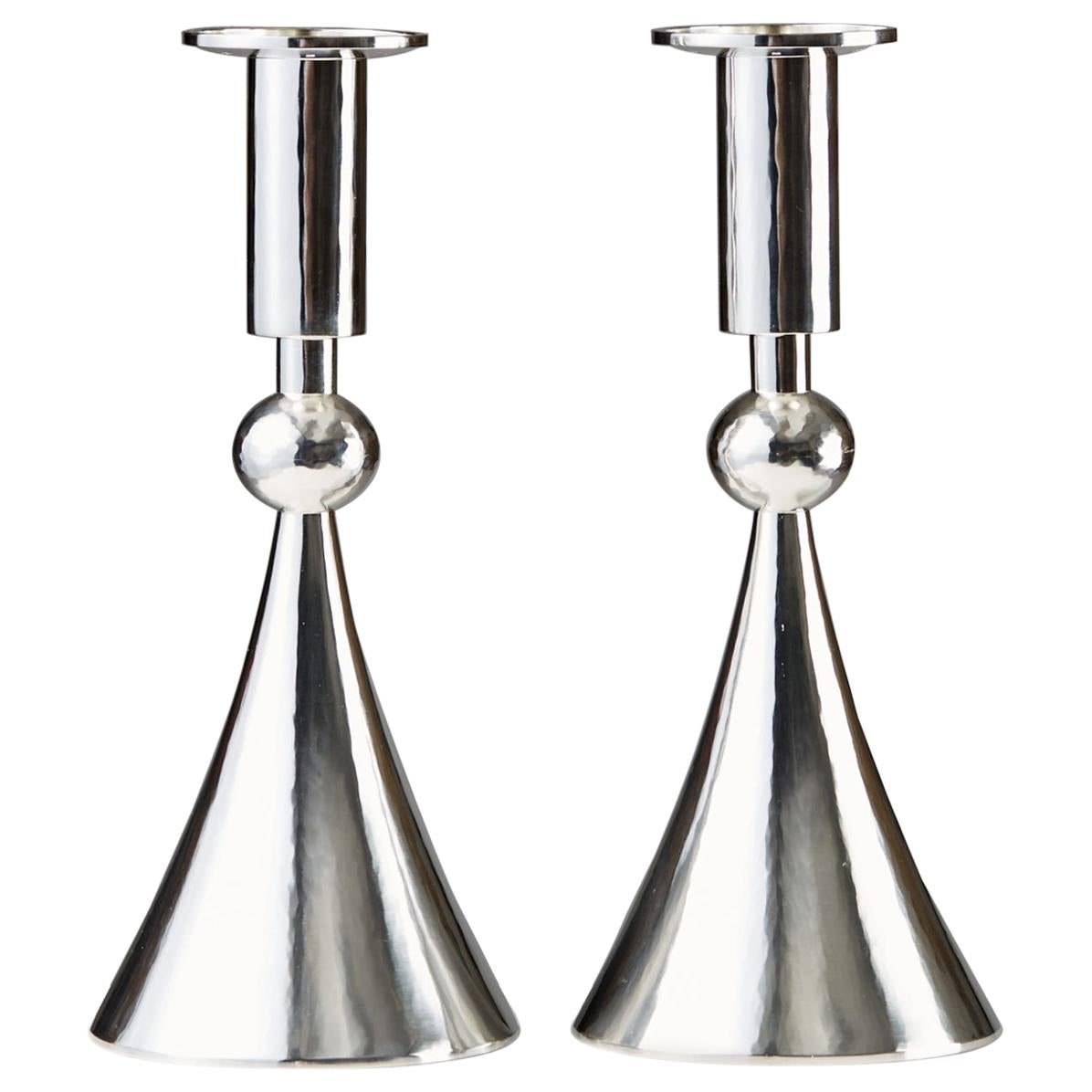 Pair of candlesticks designed by Sigurd Persson,
Sweden. 1964.

Sterling silver.

Measurements: 
H: 21.5 cm/ 8 1/2