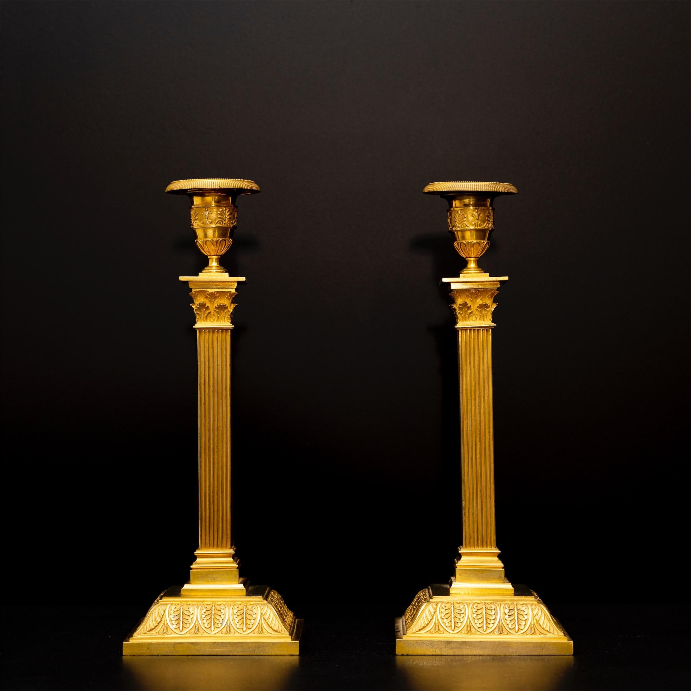 Pair of bronze, fire-gilt Empire candlesticks, Empire, Sweden, early 19th century.