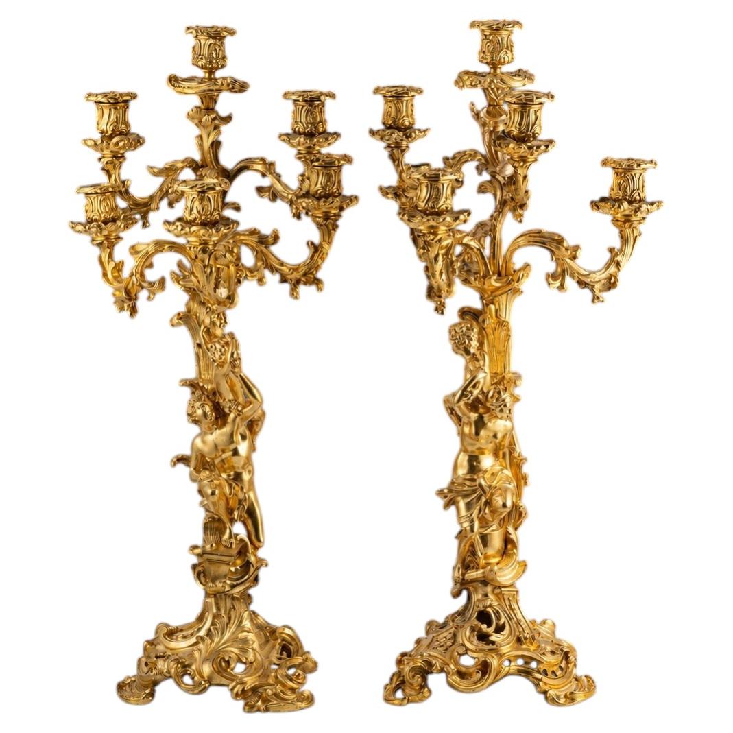 Pair of candlesticks. Gilt bronze. 19th century, following French models.