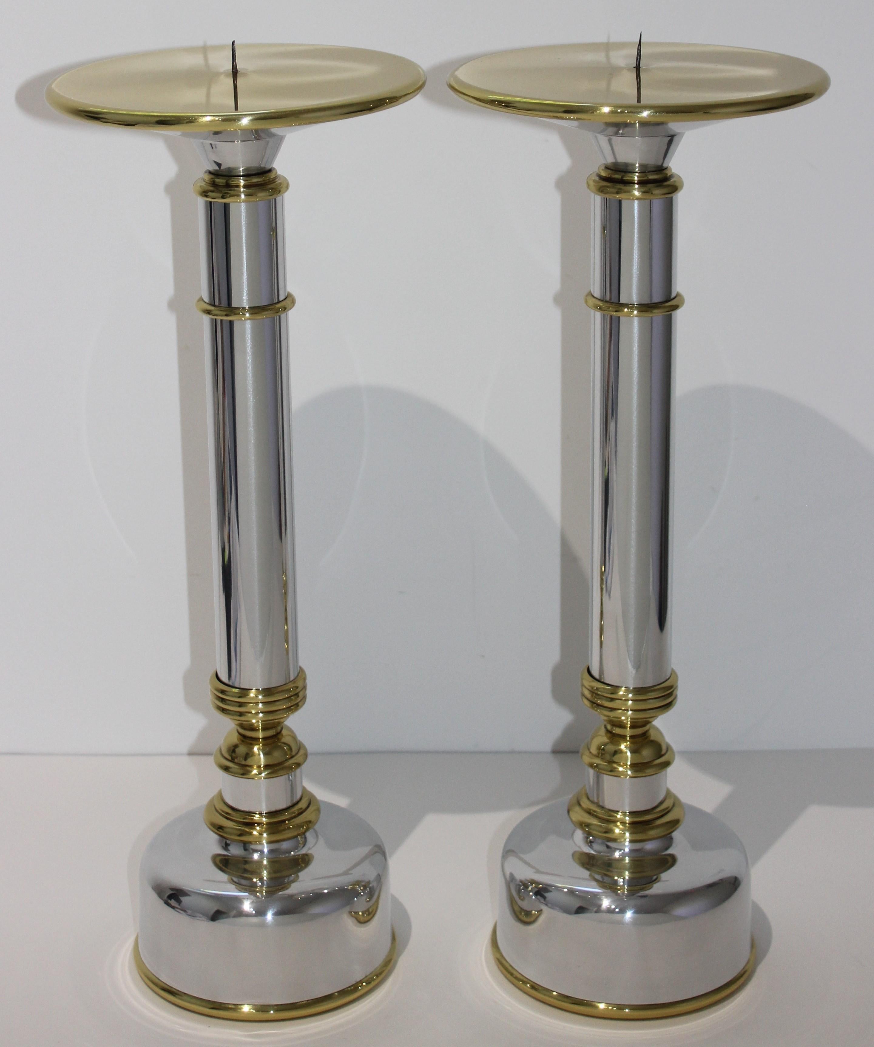 This stylish, large scale pair of candlesticks date to the 1970s and they have been professionally polshed and lacquered.