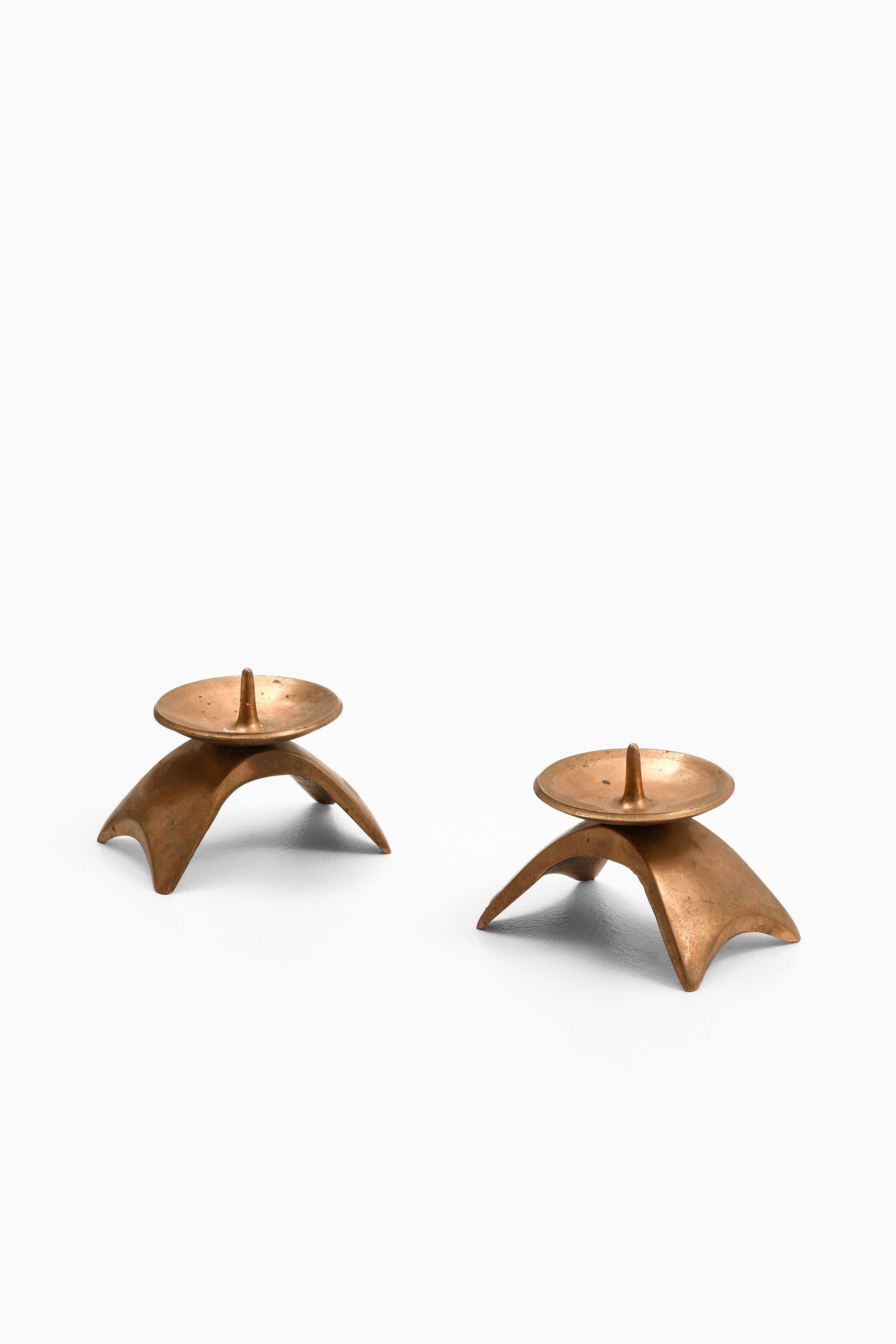 Pair of Candlesticks in Brass, 1960's

Additional Information:
Material: Brass
Style: Mid century, Scandinavian
Produced by Ekbergs Malm, Sweden
Dimensions (W x D x H): 11 x 8 x 7.5 cm