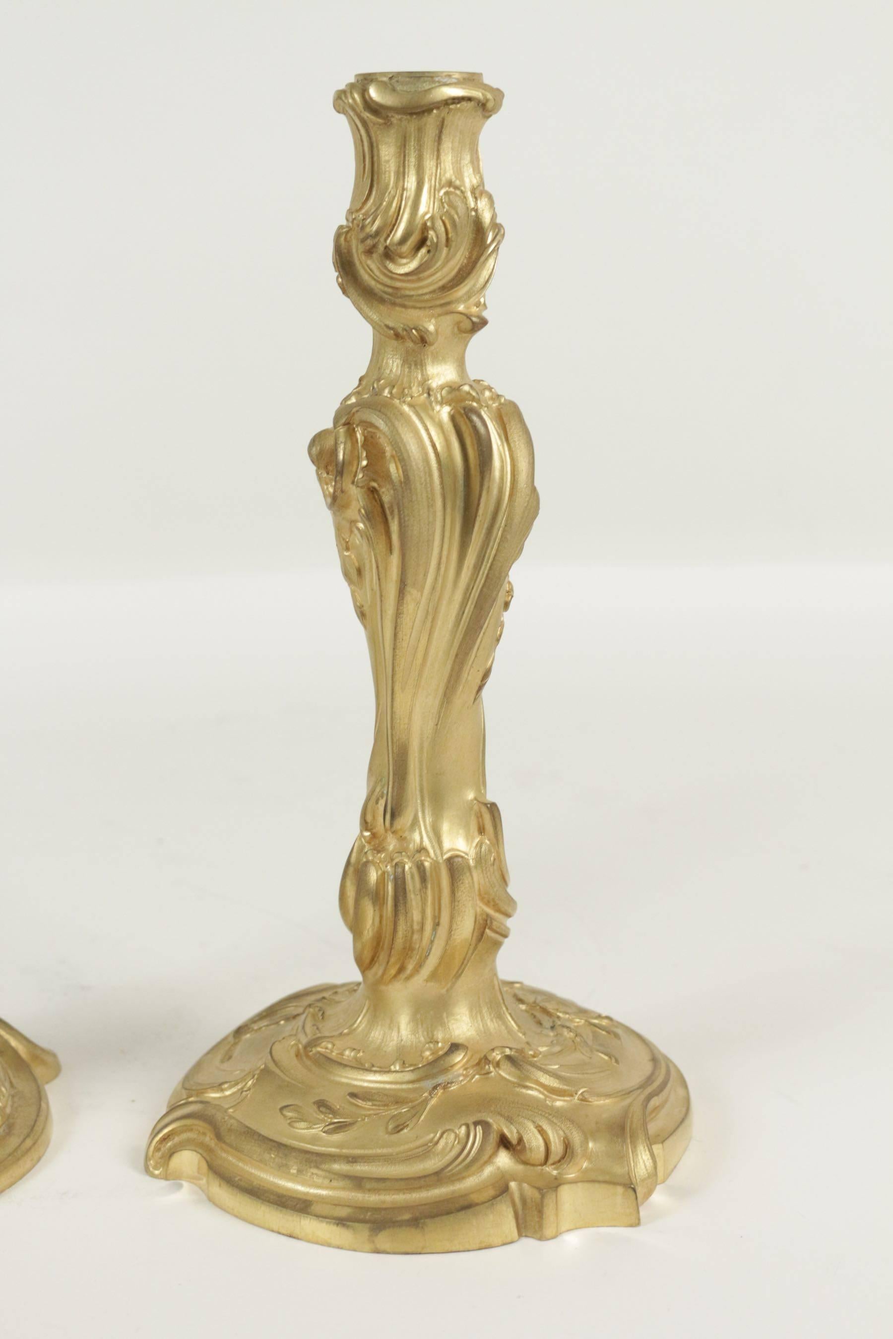 Gilt Pair of Candlesticks in Bronze from the 19th Century in the Louis XV Style