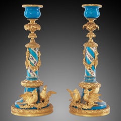 Pair of candlesticks in gilt bronze, 19th century