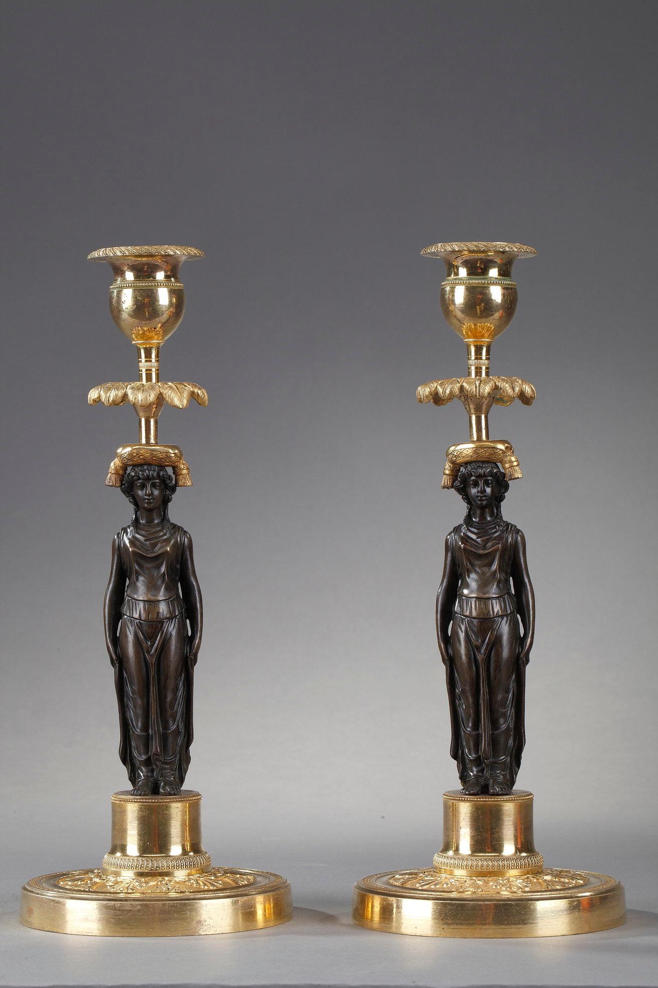 Charles X Pair of Candlesticks in Patinated and Gilded Bronze