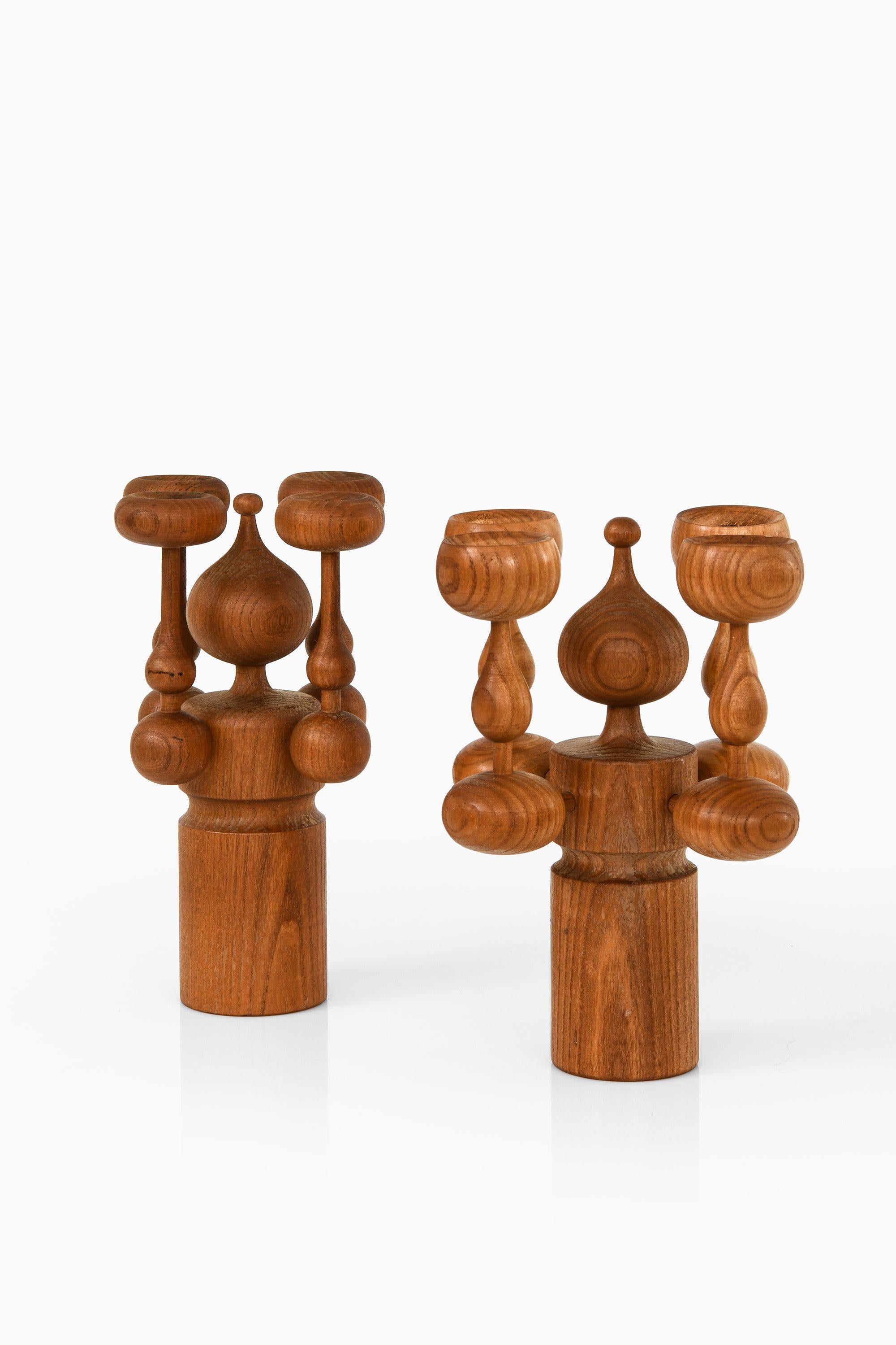 Pair of Candlesticks in Teak by Erik Höglund, 1950's

Additional Information:
Material: Teak
Style: Mid century, Scandinavian
Produced by Boda Trä in Sweden
Dimensions (W x D x H): 20 x 20 x 25 cm
Dimensions (W x D x H): 16.5 x 16.5 x 25.5