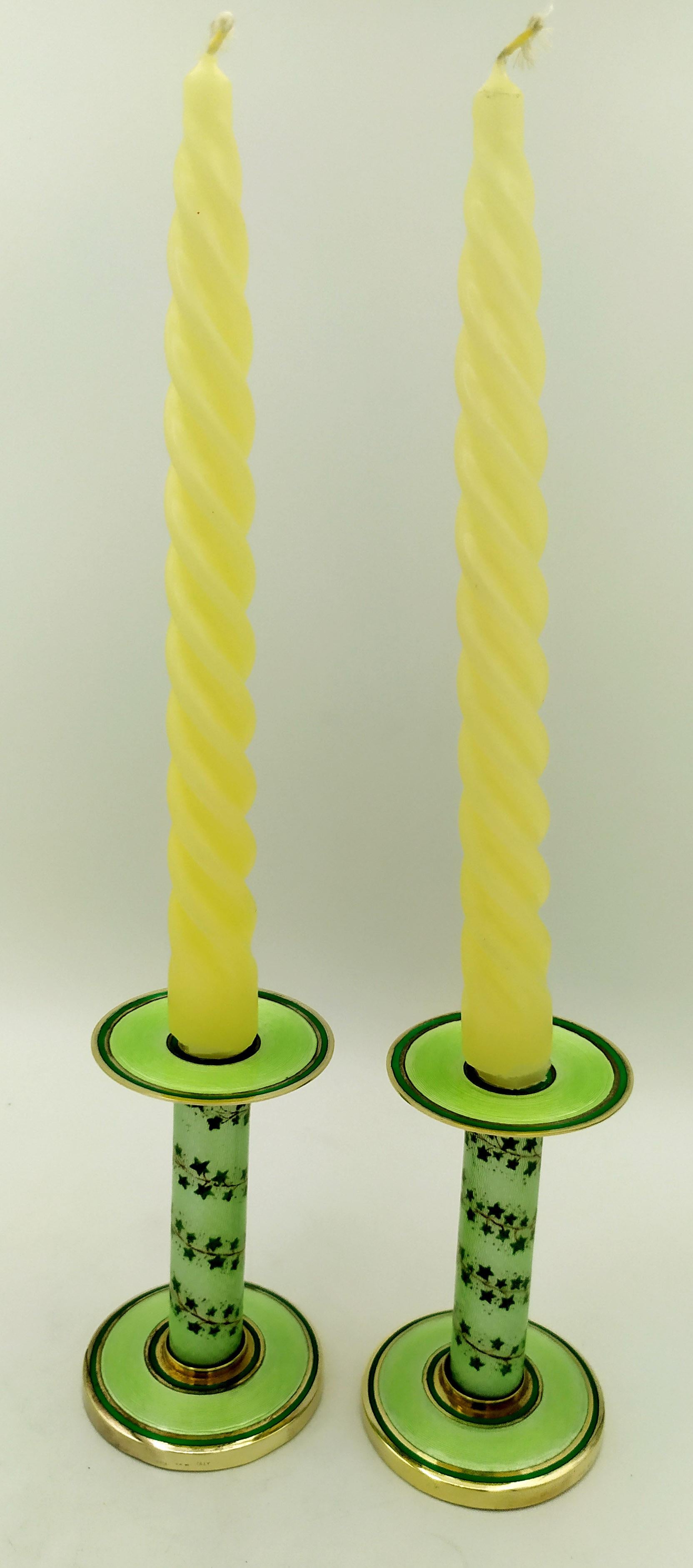 Pair of Candlesticks light Green Enamel and hand painted ivy on Sterling Silver Salimbeni
Pair of gold-plated 925/1000 sterling silver candlesticks with translucent fired enamels on guillochè and fine hand-painted miniature of floral shoots wrapped