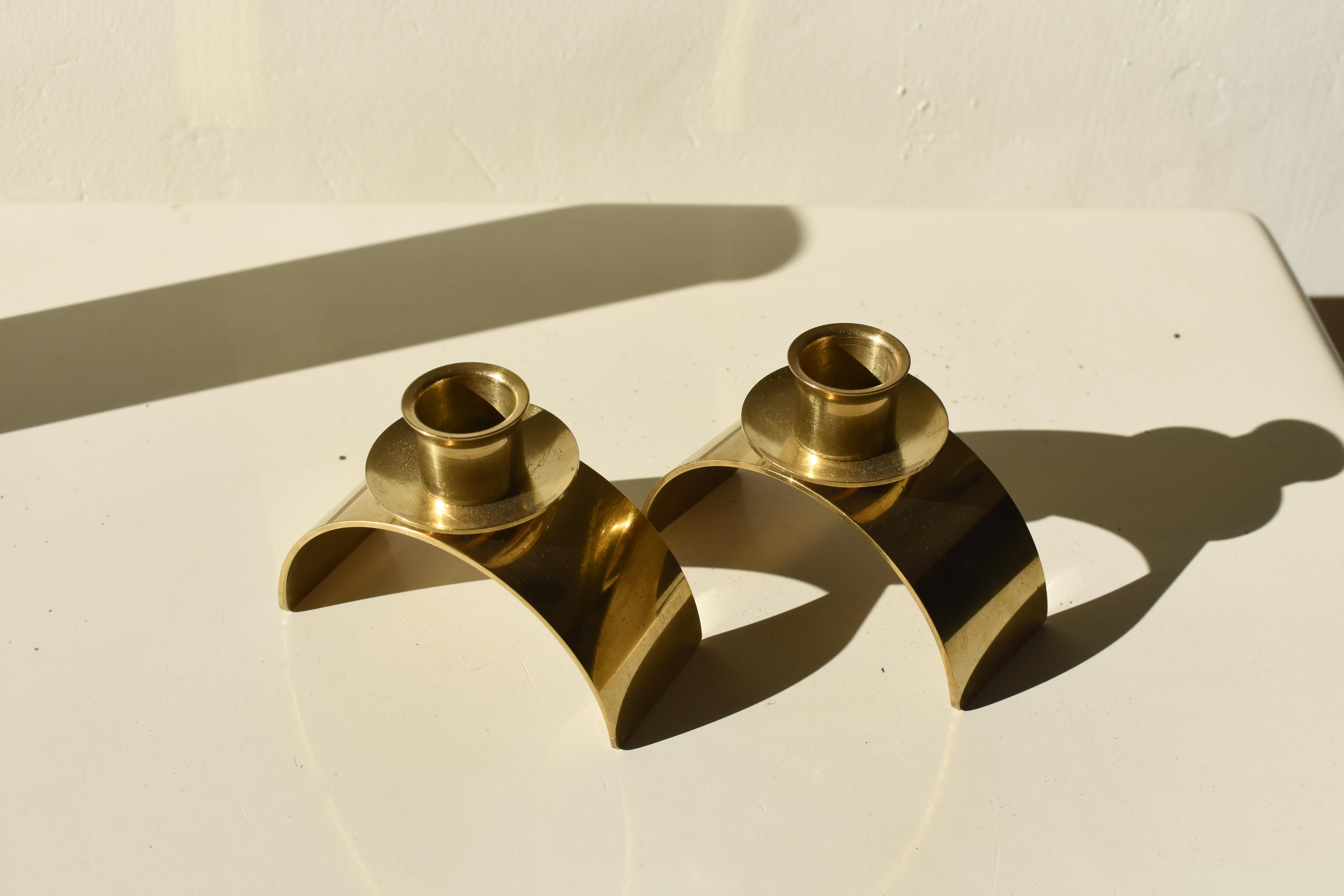 Coppia di candelieri in ottone modello 