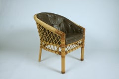 Pair of Cane and Leather Armchairs by Bielecky Bros. NYC