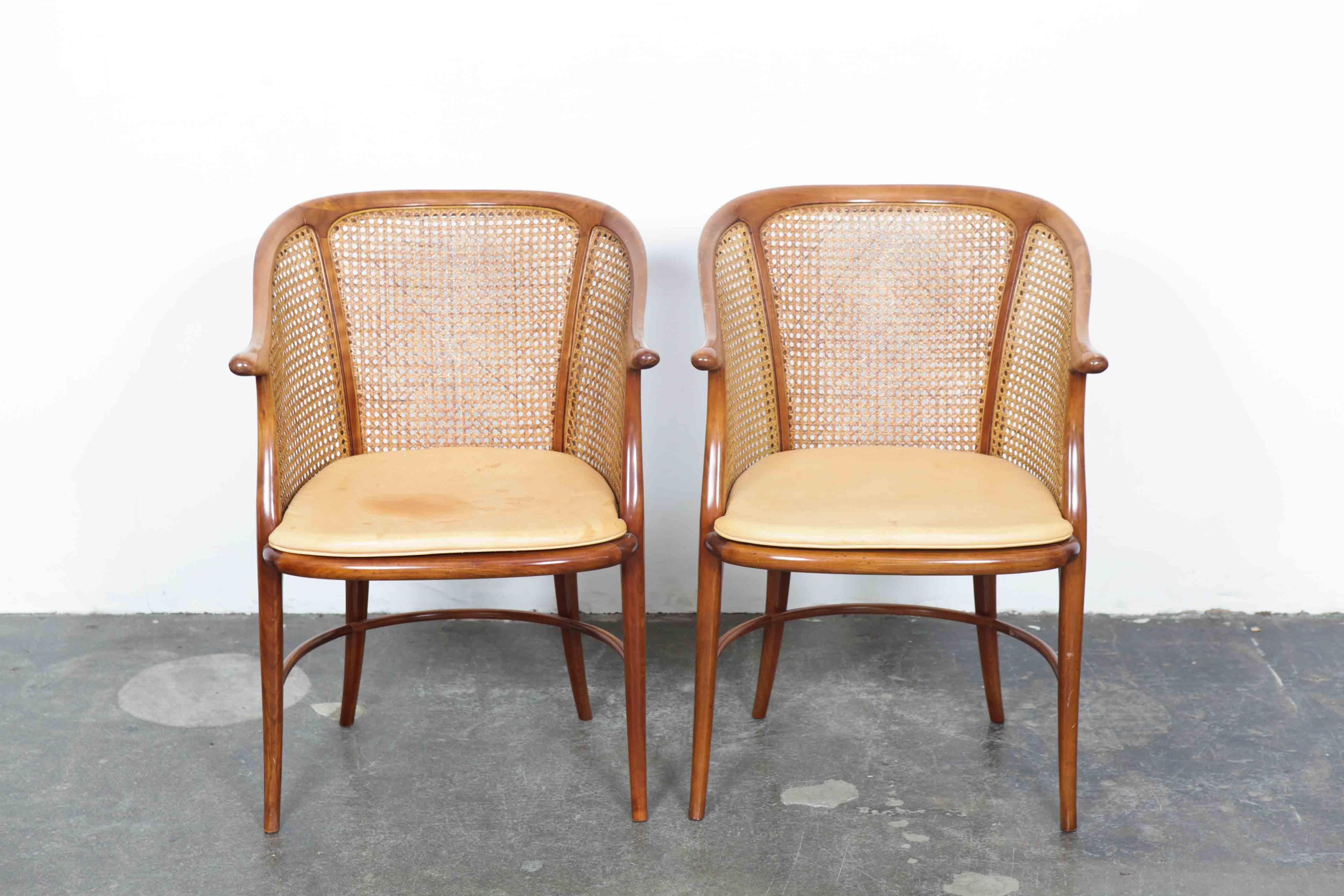 Beautiful set of vintage cheerywood frame chairs with original undamaged cane backs and leather seats. Made in Italy, most likely 1970s, designer and maker unknown. Very elegant, clean lined side chairs. The leather seat pads are original and show