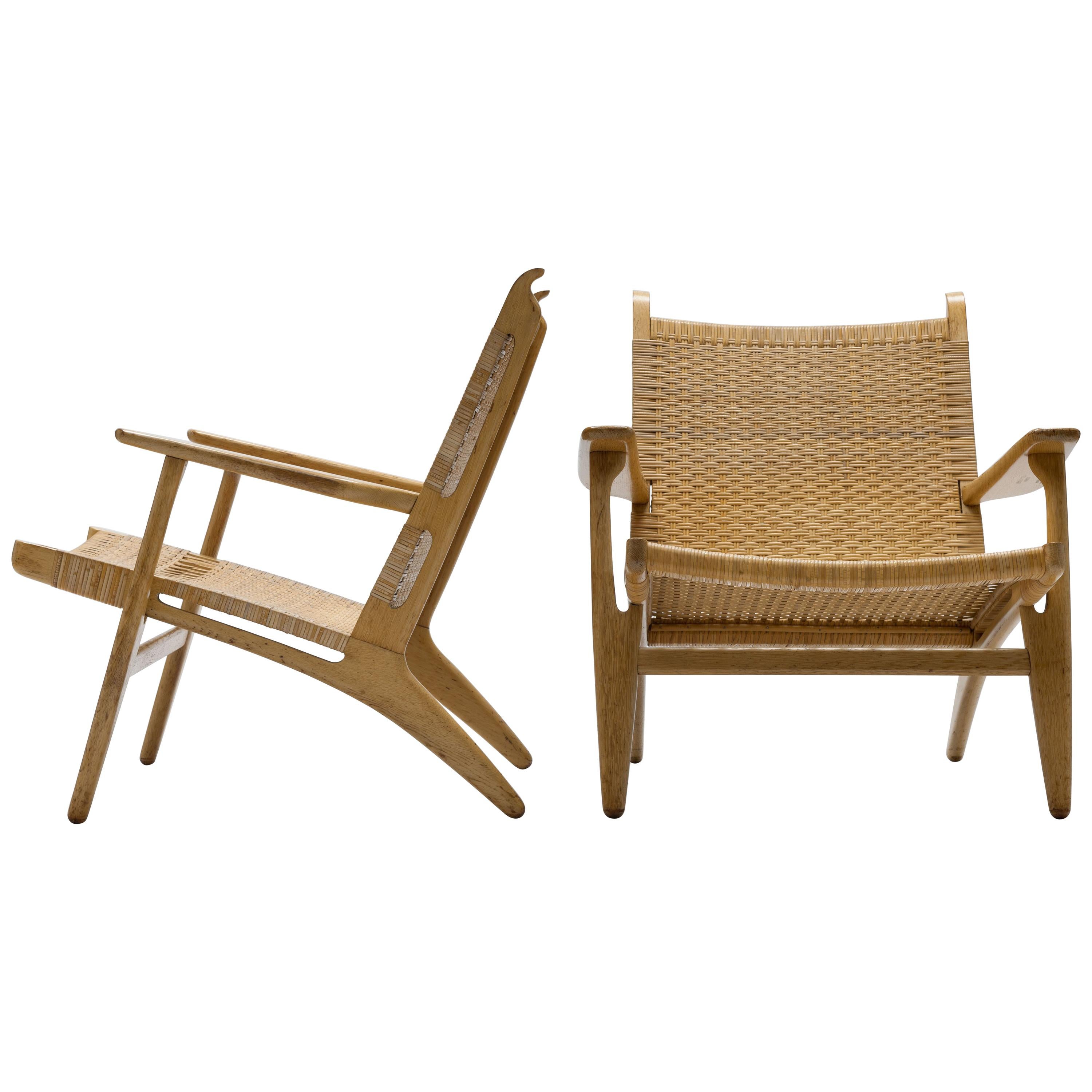Pair of Cane and Oak Hans Wegner CH27 Lounge Chairs, Carl Hansen & Son