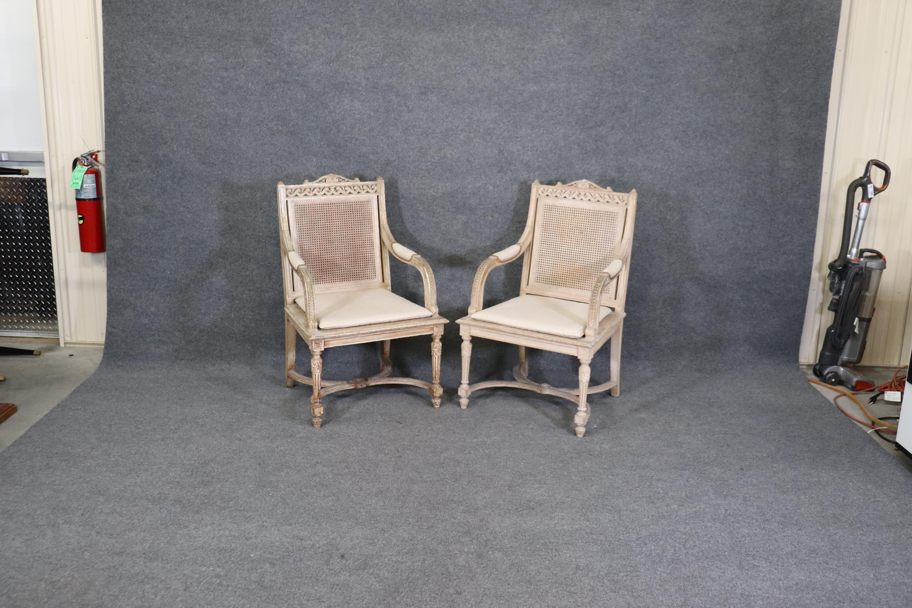 French   Pair of Cane Back Antique White Paint Decorated Louis XVI Style Armchairs Dini For Sale