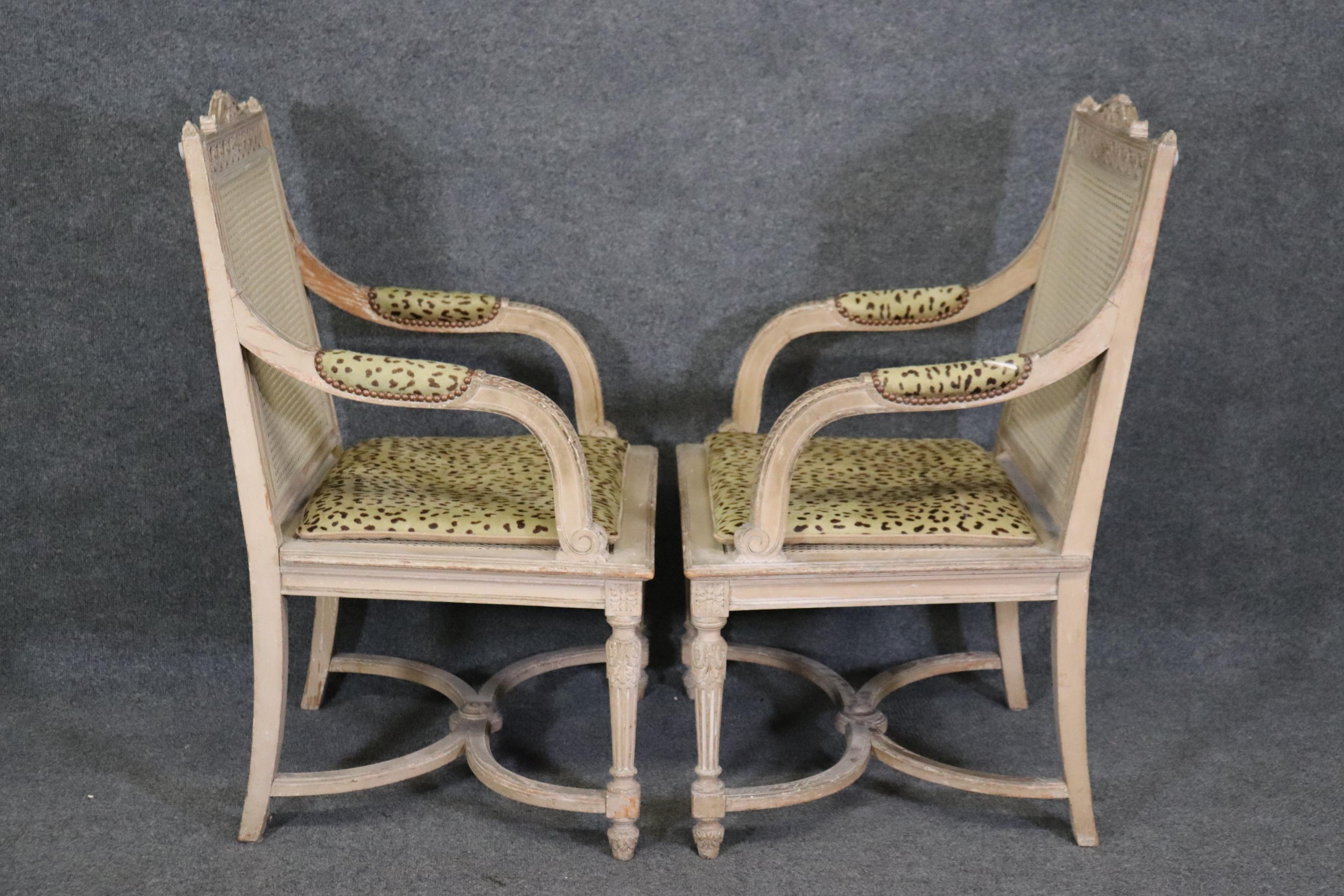Cowhide Pair of Cane Back Antique White Paint Decorated Louis XVI Style Armchairs Dining For Sale