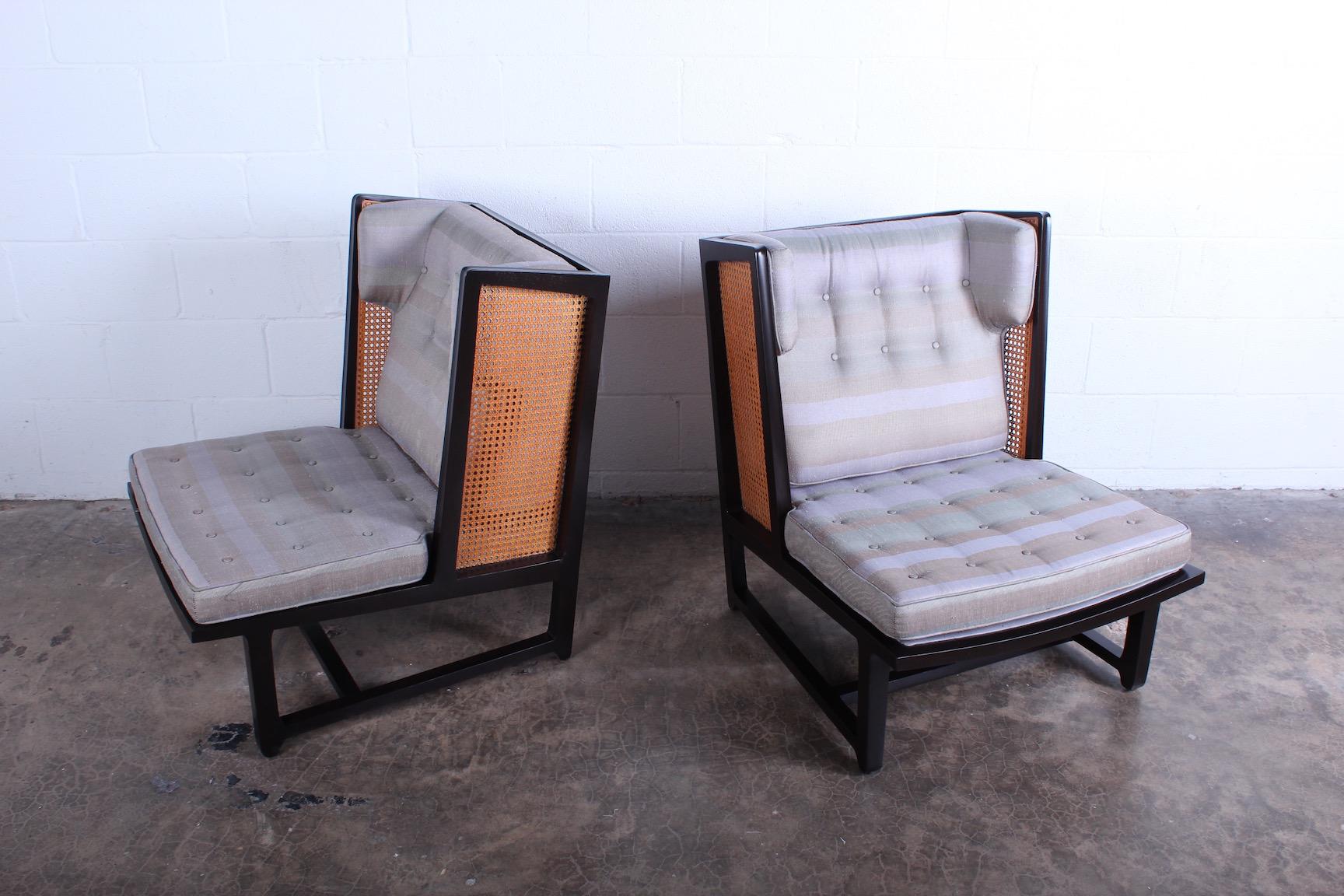 A rare pair of cane back wing chairs model 6016 designed by Edward Wormley for Dunbar, 1960.