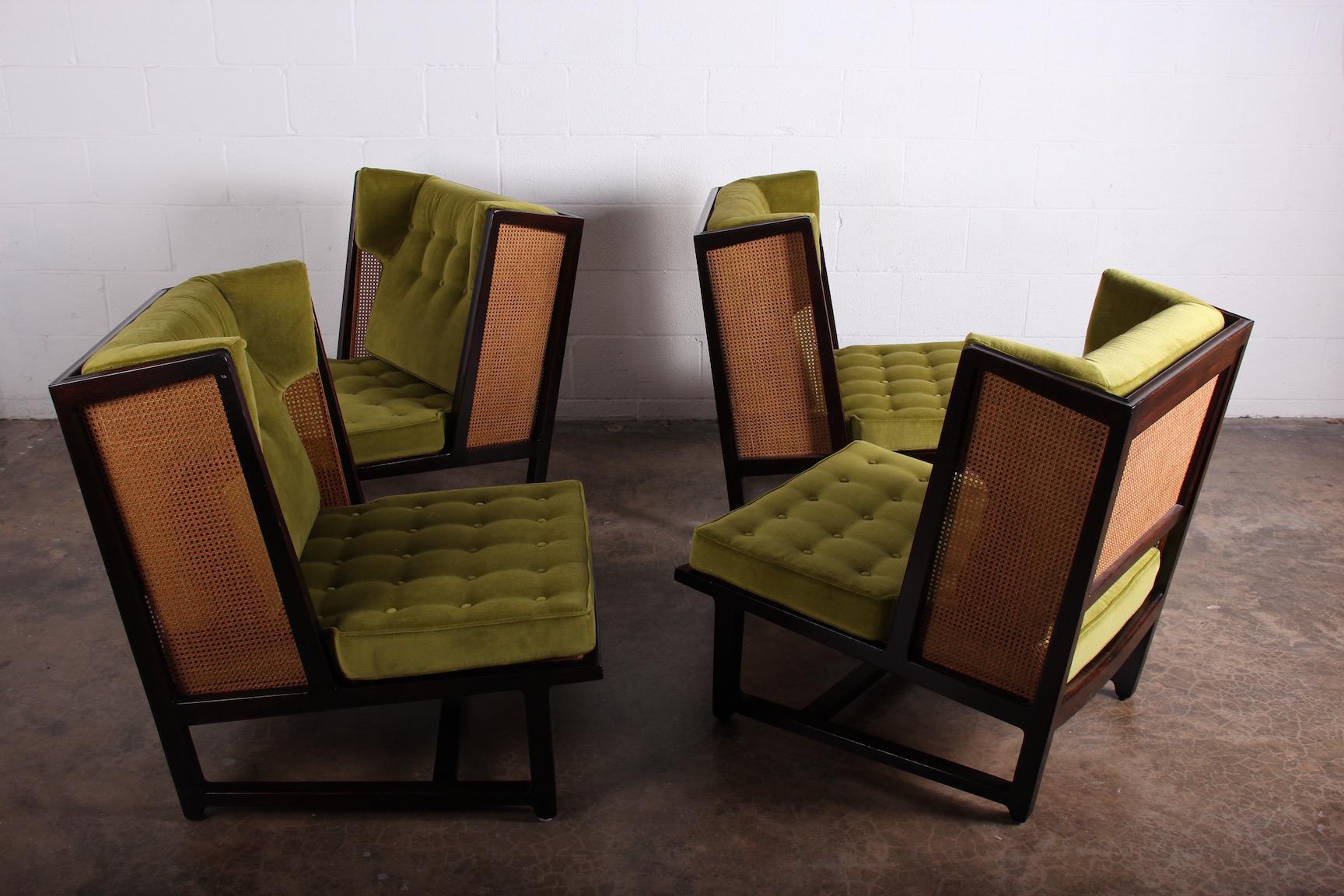 A rare pair of cane back wing chairs model 6016 designed by Edward Wormley for Dunbar, 1960. Original finish and reupholstered in green velvet. We have two pairs available.