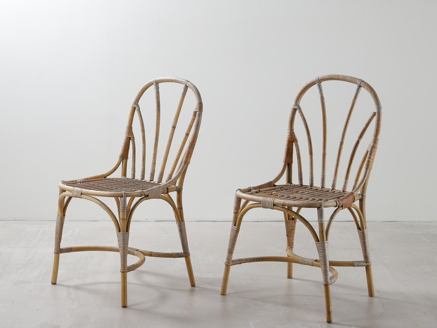 A pair of Bamboo & Rattan Chairs designed in 1947 by Josef Frank in Sweden. 

The Austrian born architect is considered to be one of the most important figures in Swedish design. Frank represented a freer, more artistic style ideal and he developed