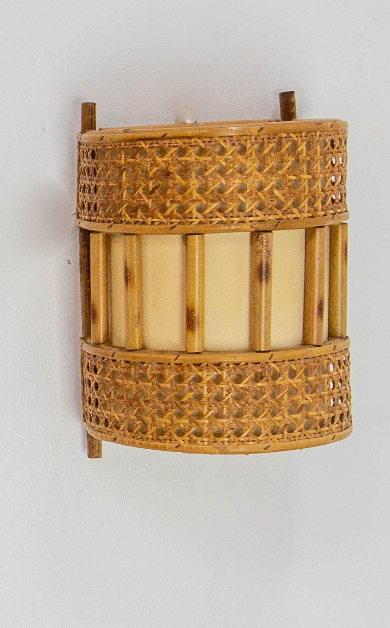 French Pair of Cane Rattan & Fabric Sconces Louis Sognot Style circa 1960 For Sale