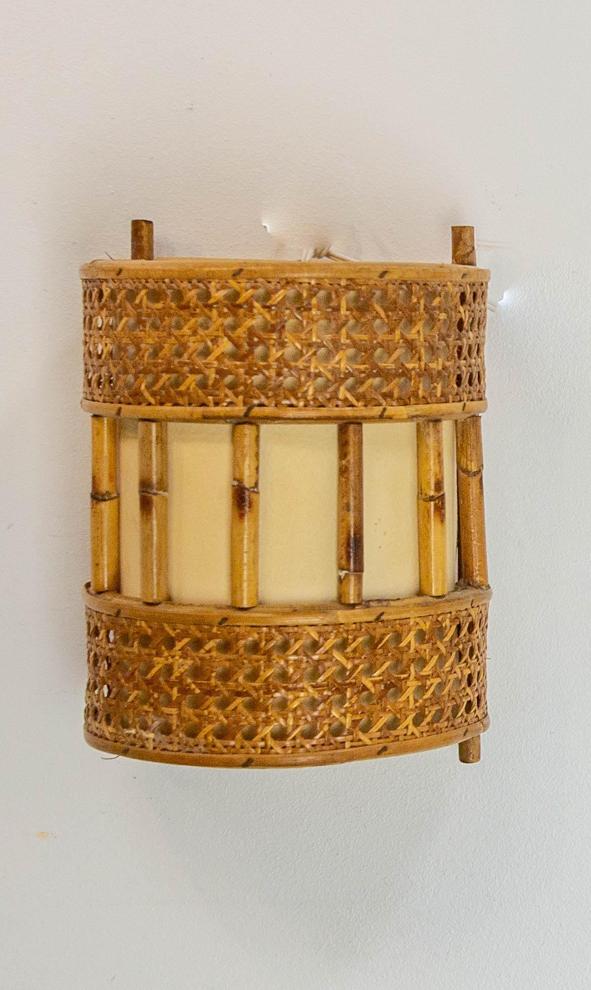 Pair of Cane Rattan & Fabric Sconces Louis Sognot Style circa 1960 In Good Condition For Sale In Labrit, Landes