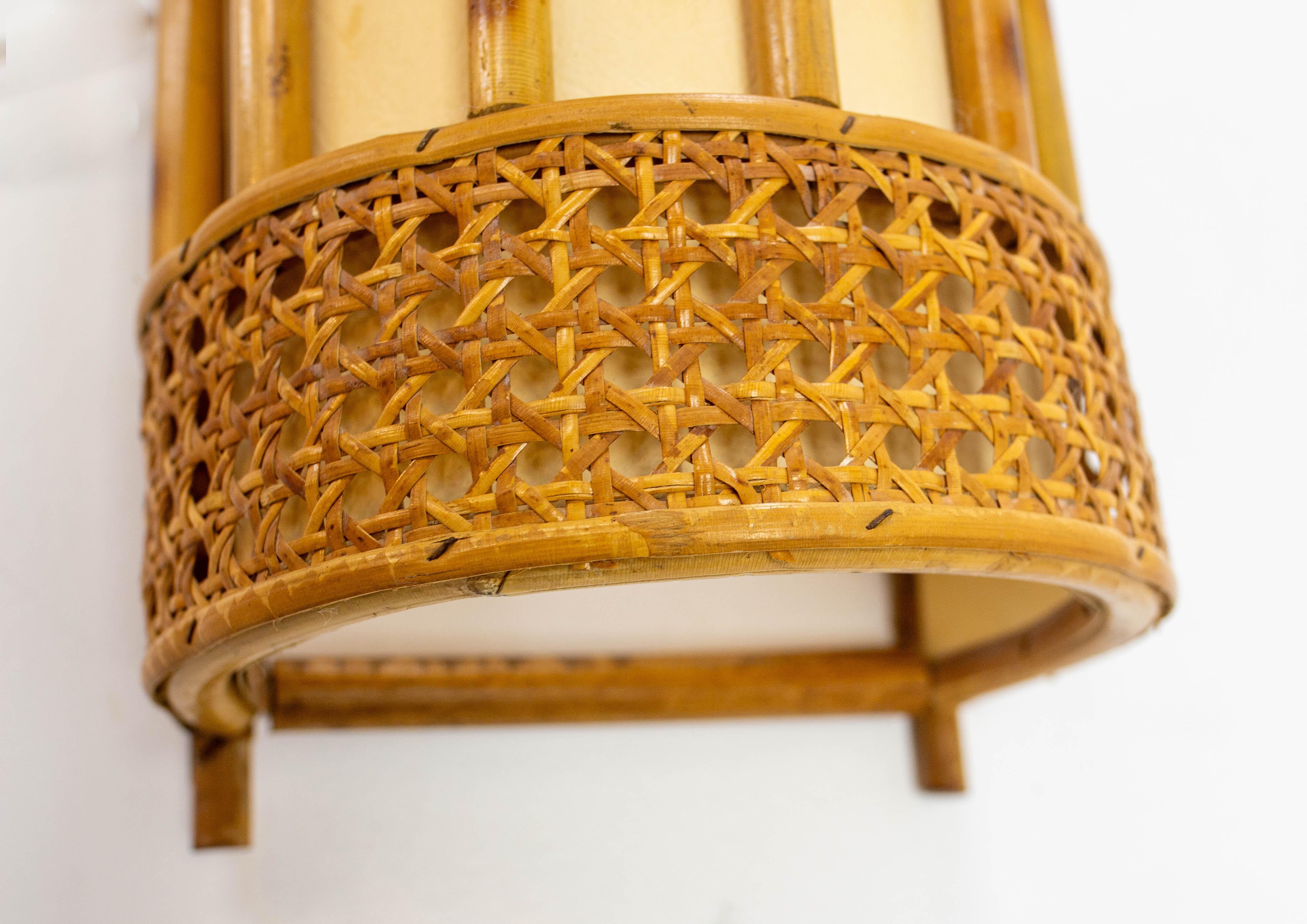 Mid-20th Century Pair of Cane Rattan & Fabric Sconces Louis Sognot Style circa 1960 For Sale