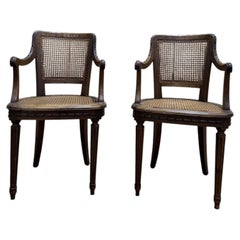 Pair of caned armchairs in Louis XVI style