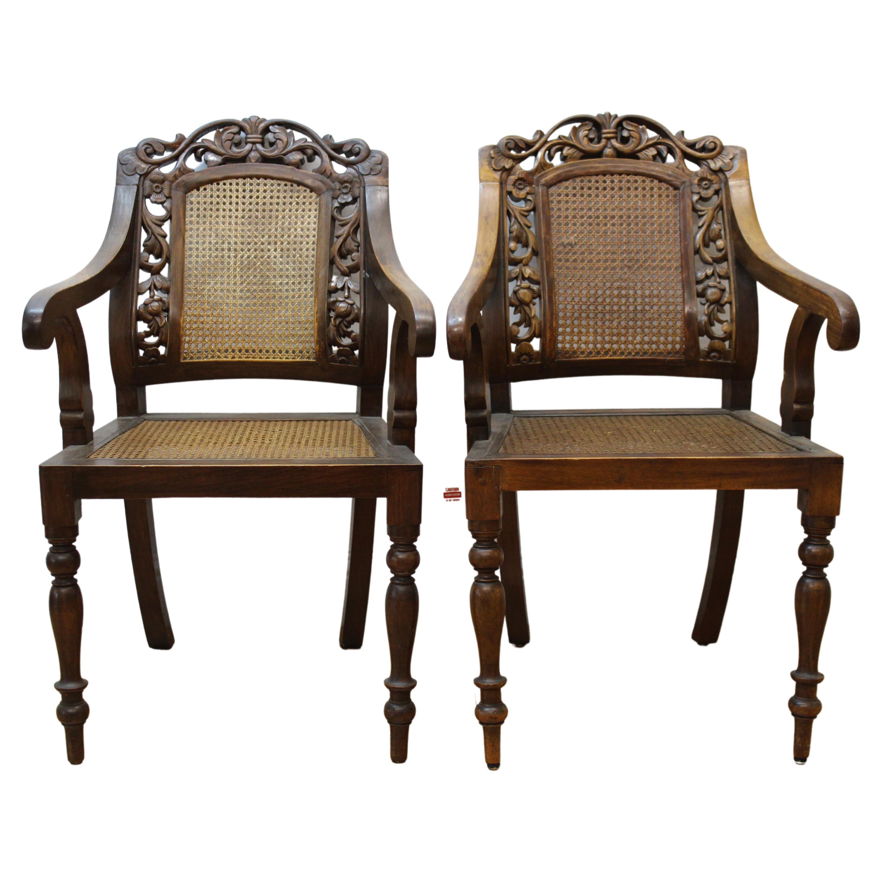 Pair of Caned & Carved Wood Arm Chairs