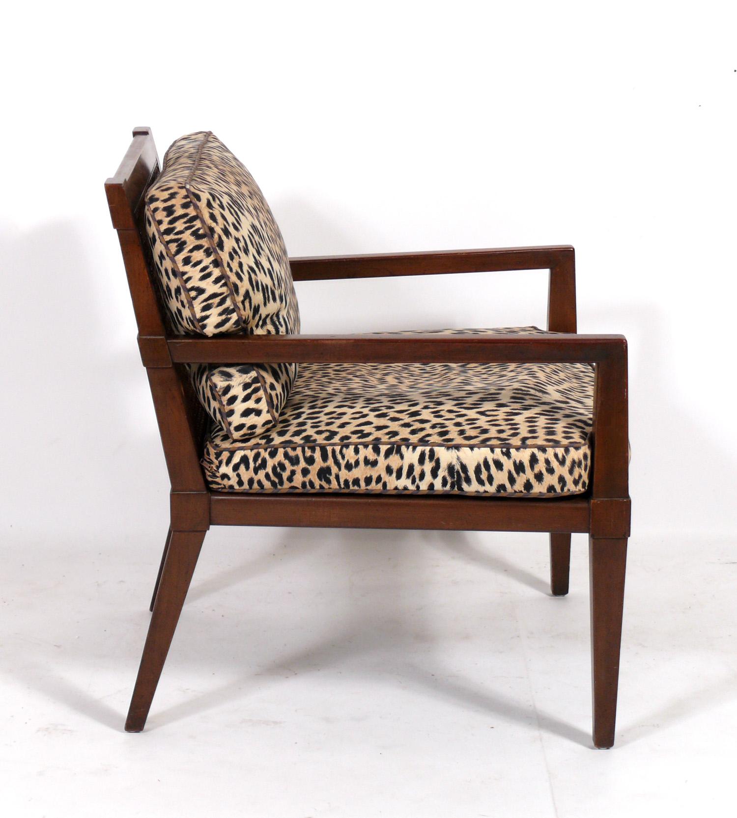 Pair of Mid Century Caned Back lounge chairs, American, circa 1950s. These chairs are being refinished and reupholstered and can be completed in your choice of wood finish color and reupholstered in your fabric. The price noted INCLUDES refinishing