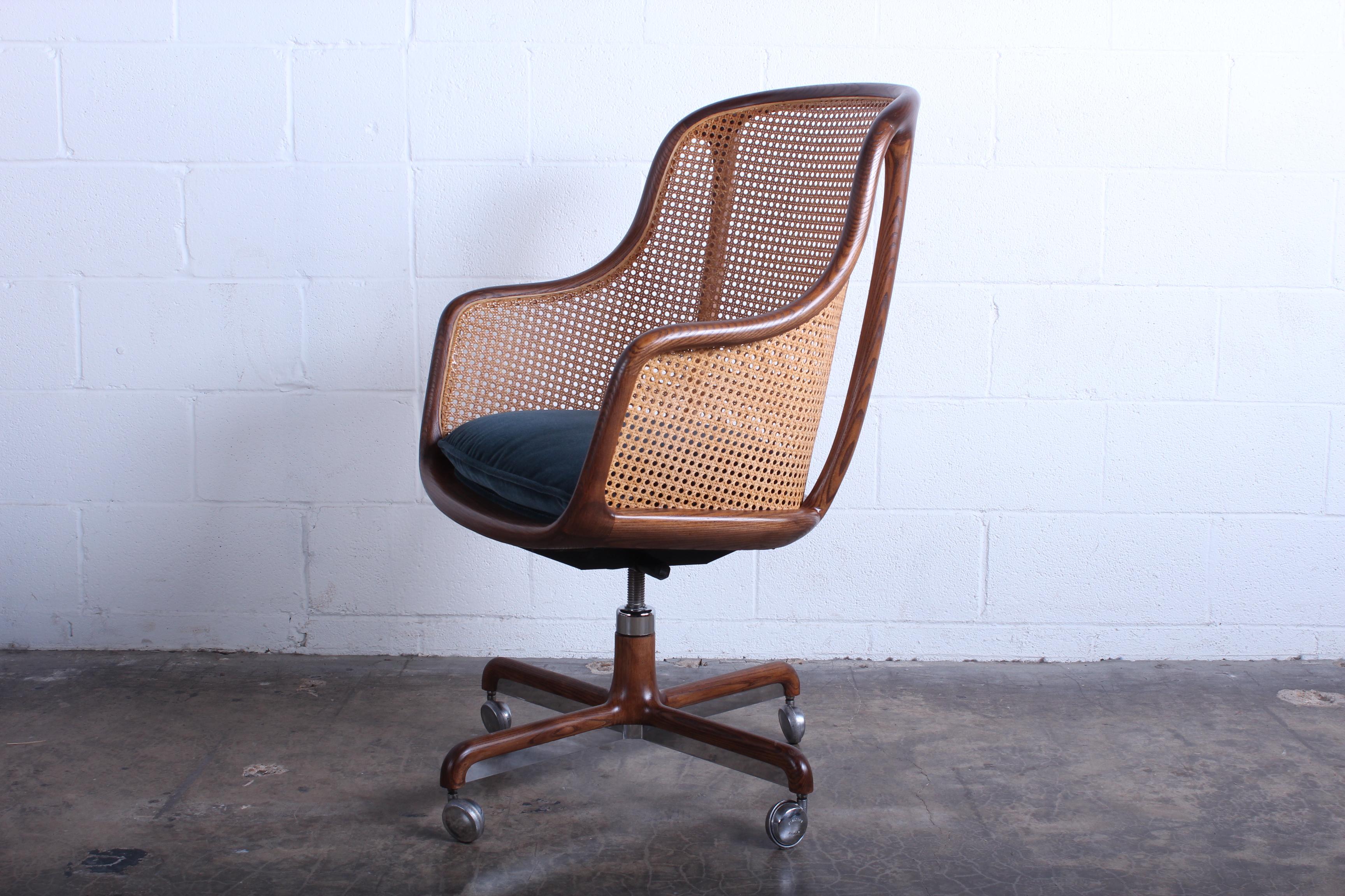 This price includes refinishing, re-cane and reupholstery COM. 