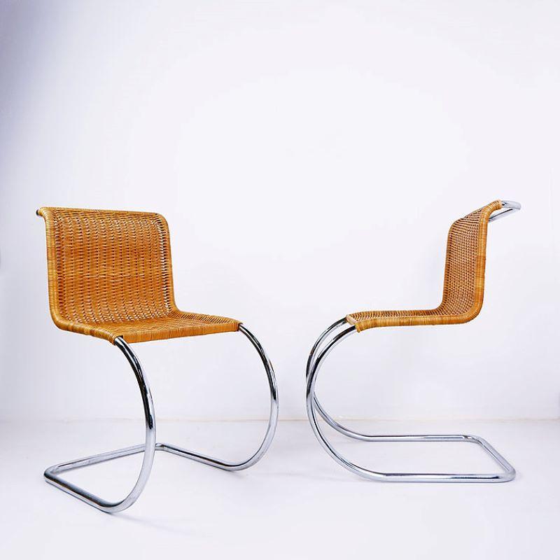 Pair of wicker cantilever chairs in the style of german architect Ludwig Mies vand der Roher, from the 1950's.