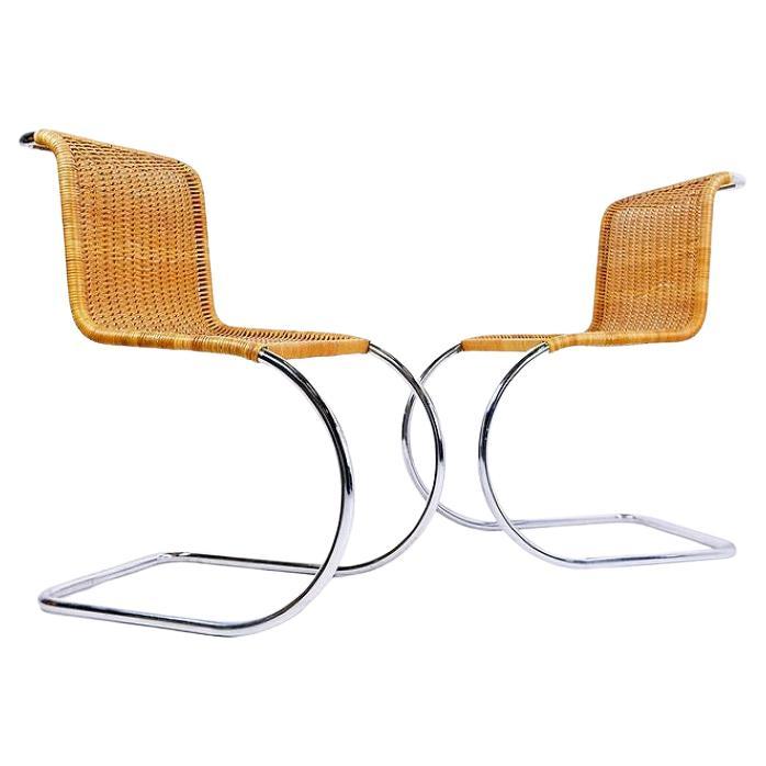 Pair of Cantilever chrome and Wicker Chairs in the style of Mies Van der Roye For Sale