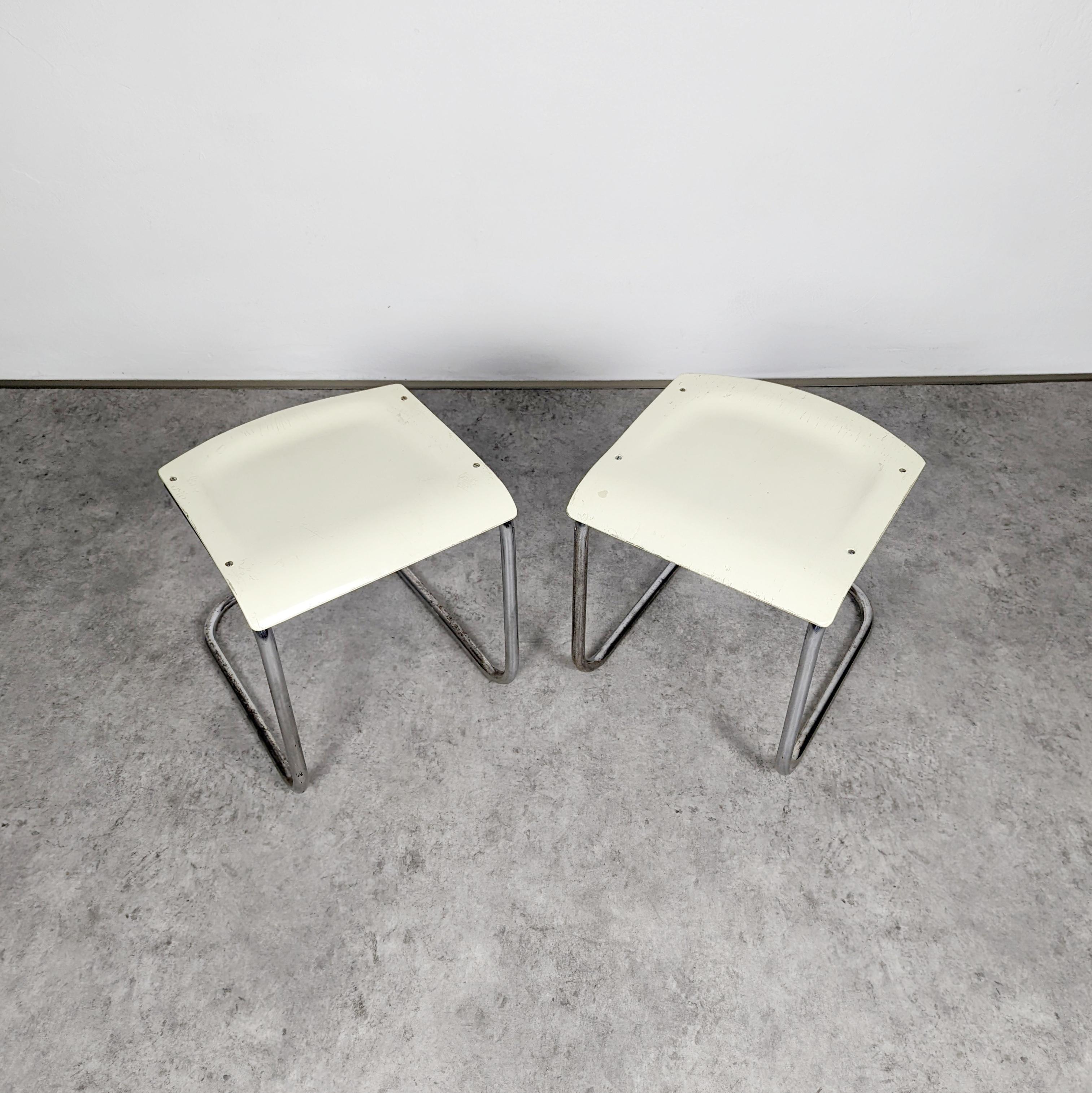 Lacquered Pair of cantilever tubular steel Bauhaus stools by Mart Stam For Sale