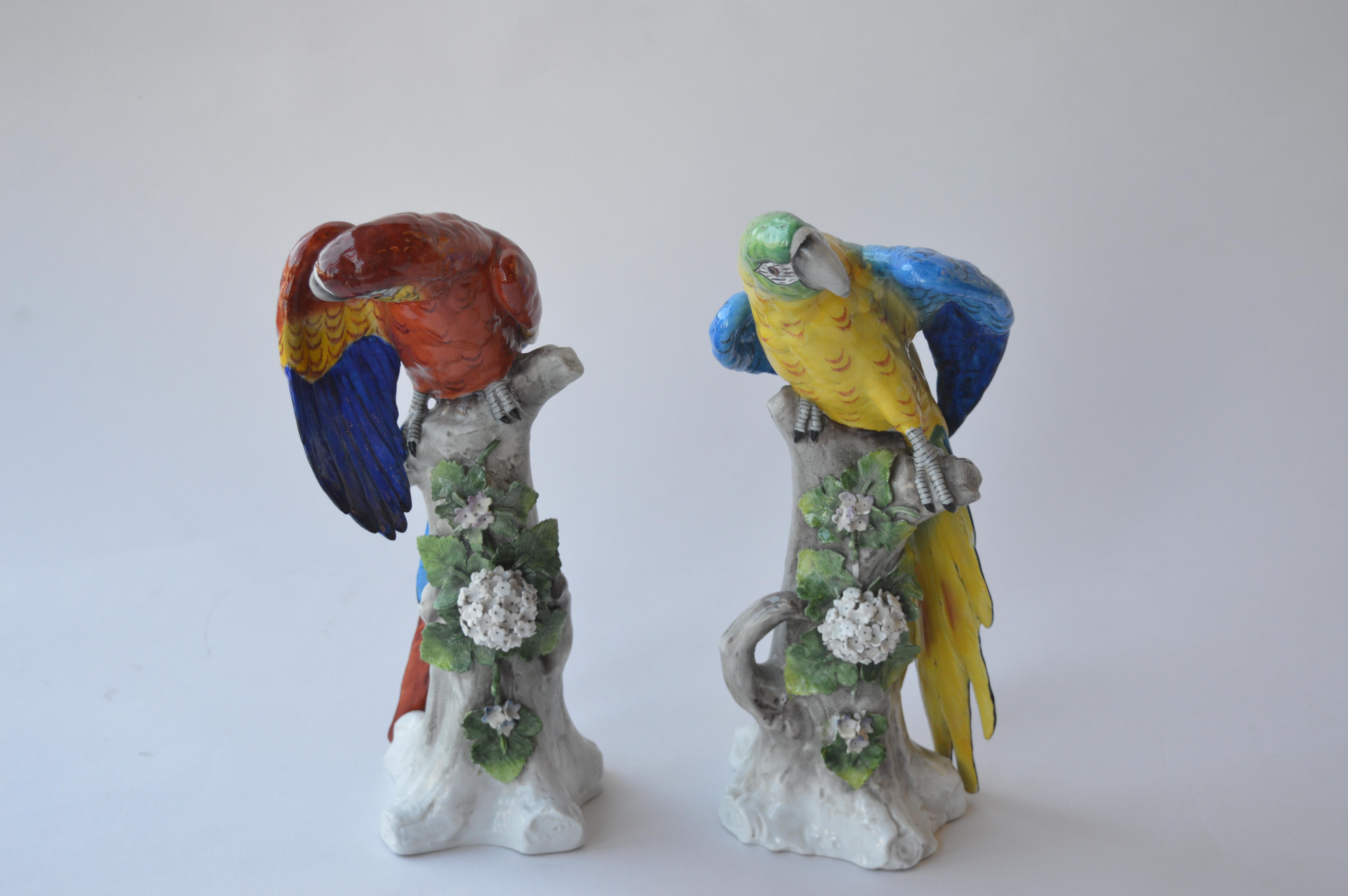 Pair of Capodimonte porcelain parrots. N with crown mark on the bottom