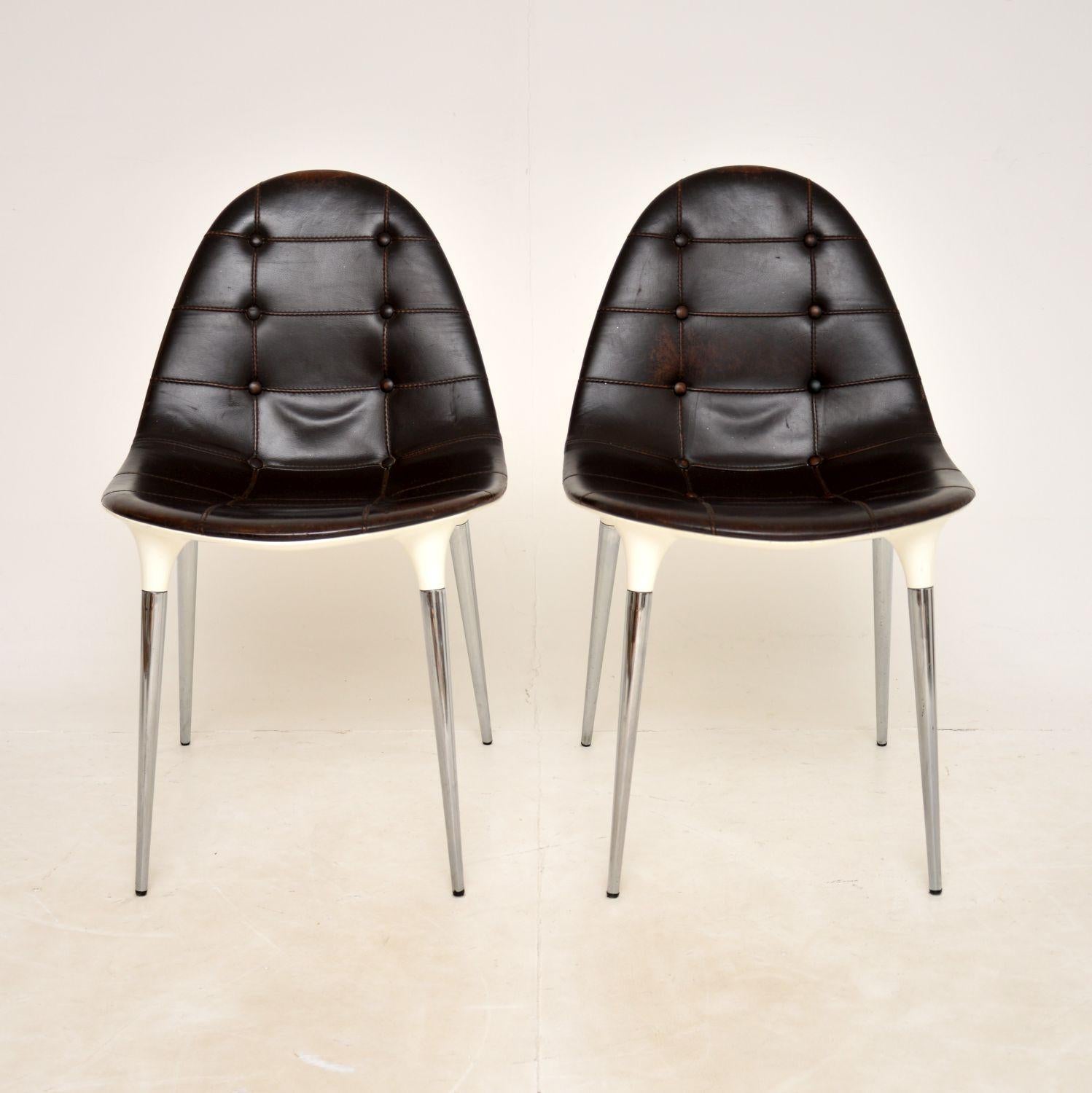 A stunning pair of modernist chairs with a retro / space age feel. This model is called the Caprice chair, they were designed by Philippe Starck in 2007 and made in Italy by Cassina.

They seat on chrome plated steel legs, with white nylon shell