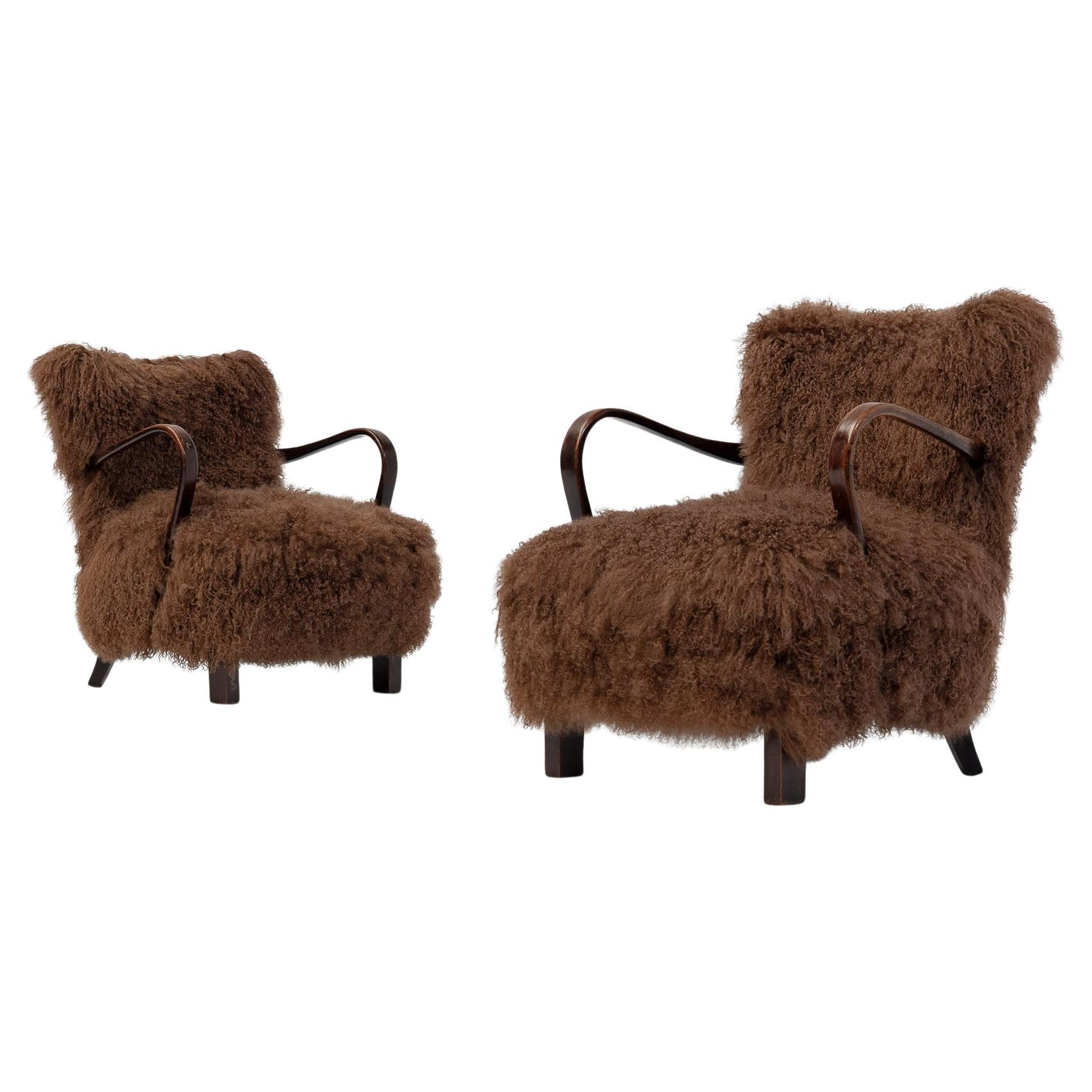 Pair of Caramel Scandinavian Art Deco Armchairs in Mongolian Sheepskin, 1950s For Sale