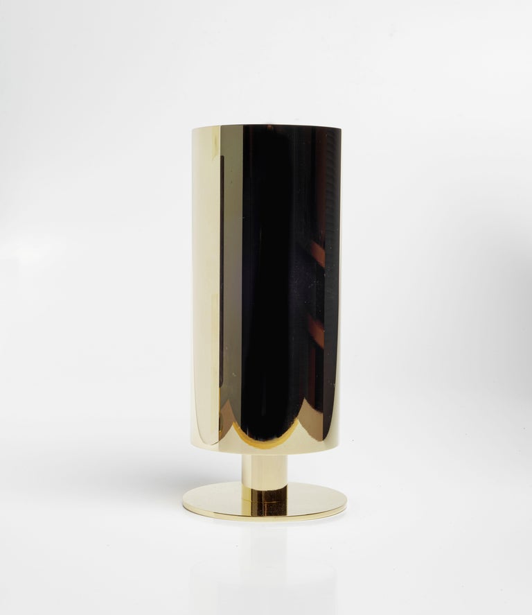 Pair of Carl Auböck #7247 vases on pedestal in polished brass and patinated brass. Also available in a smaller size. 