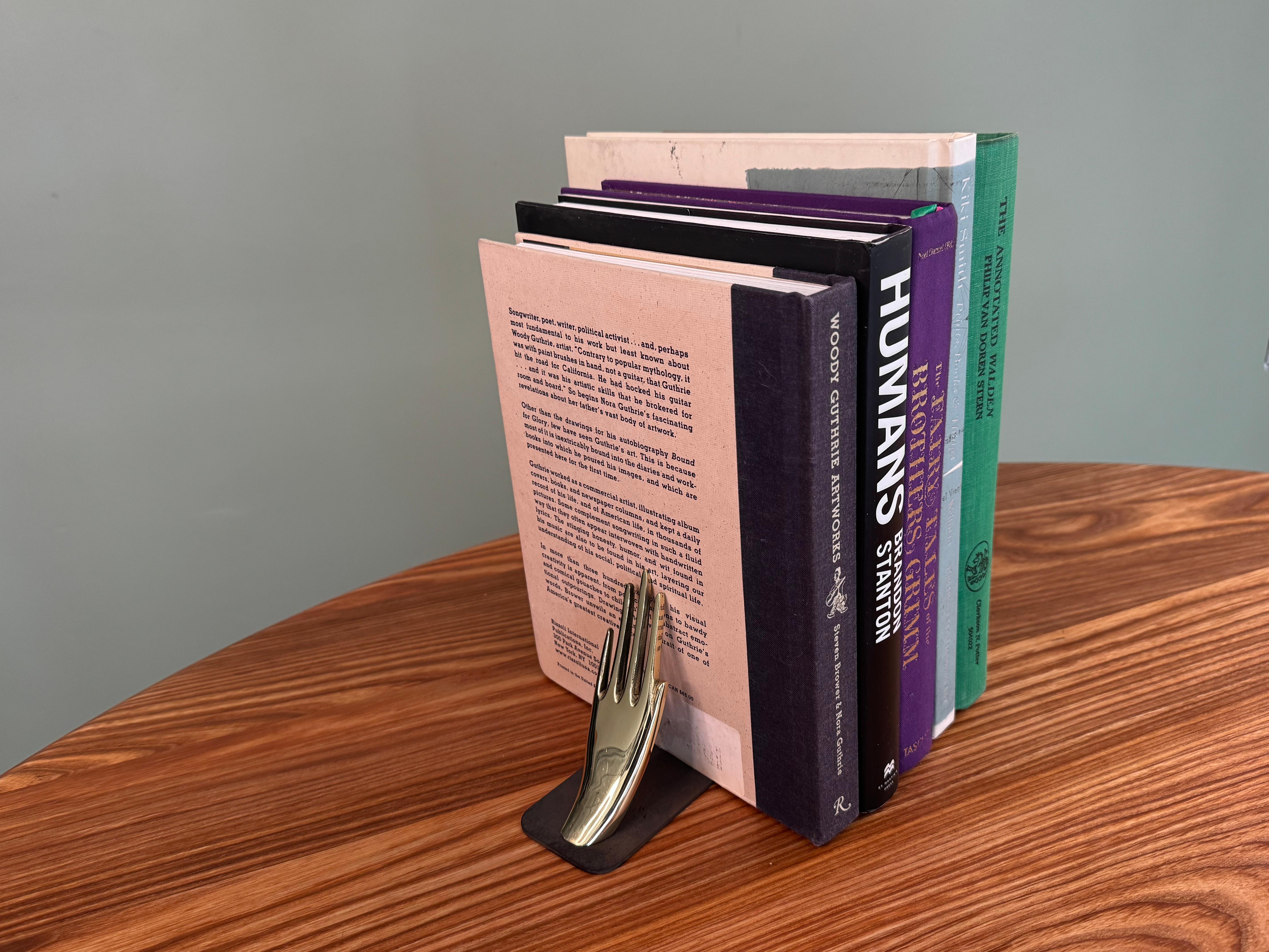 Pareja de sujetalibros de latón 