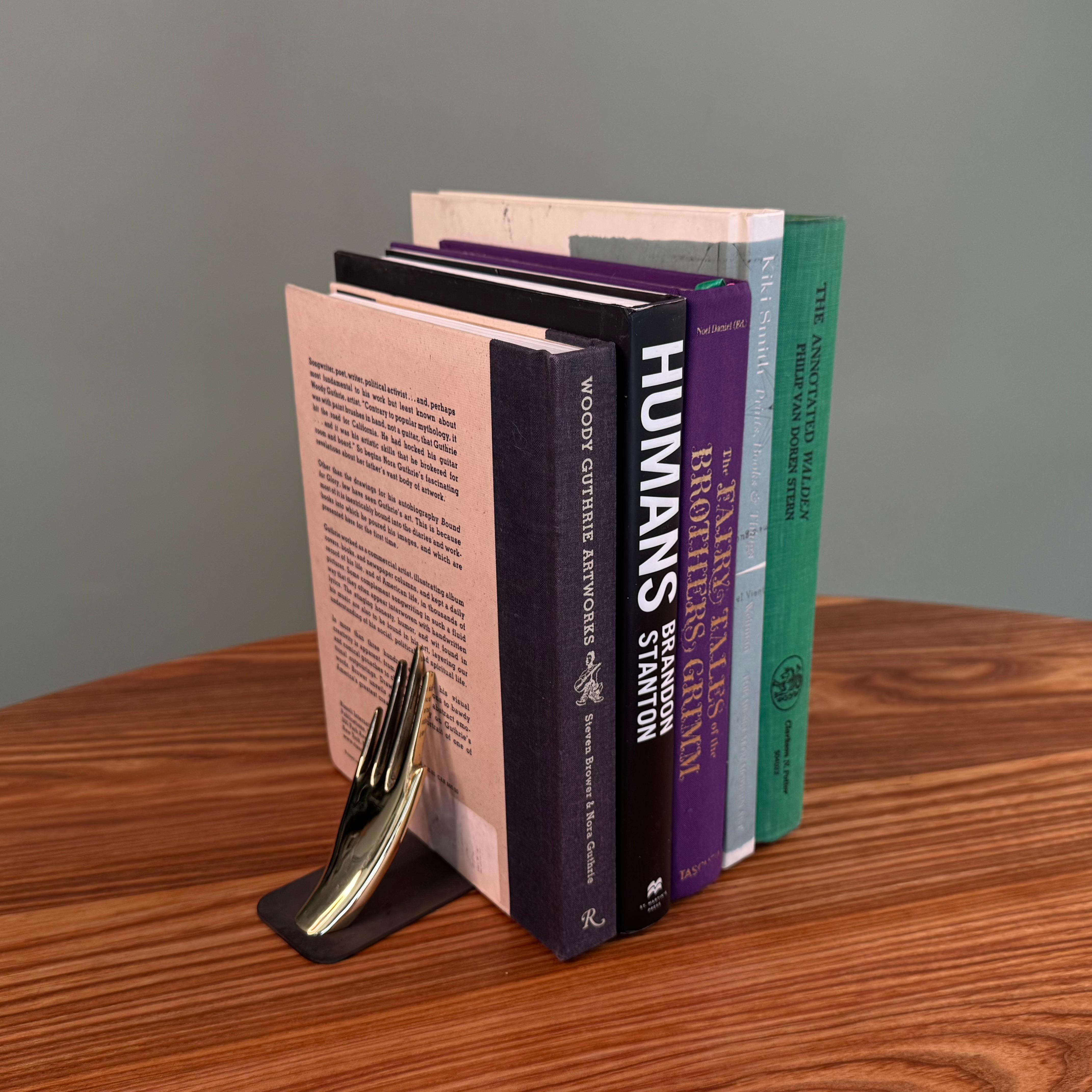 Pareja de sujetalibros de latón 