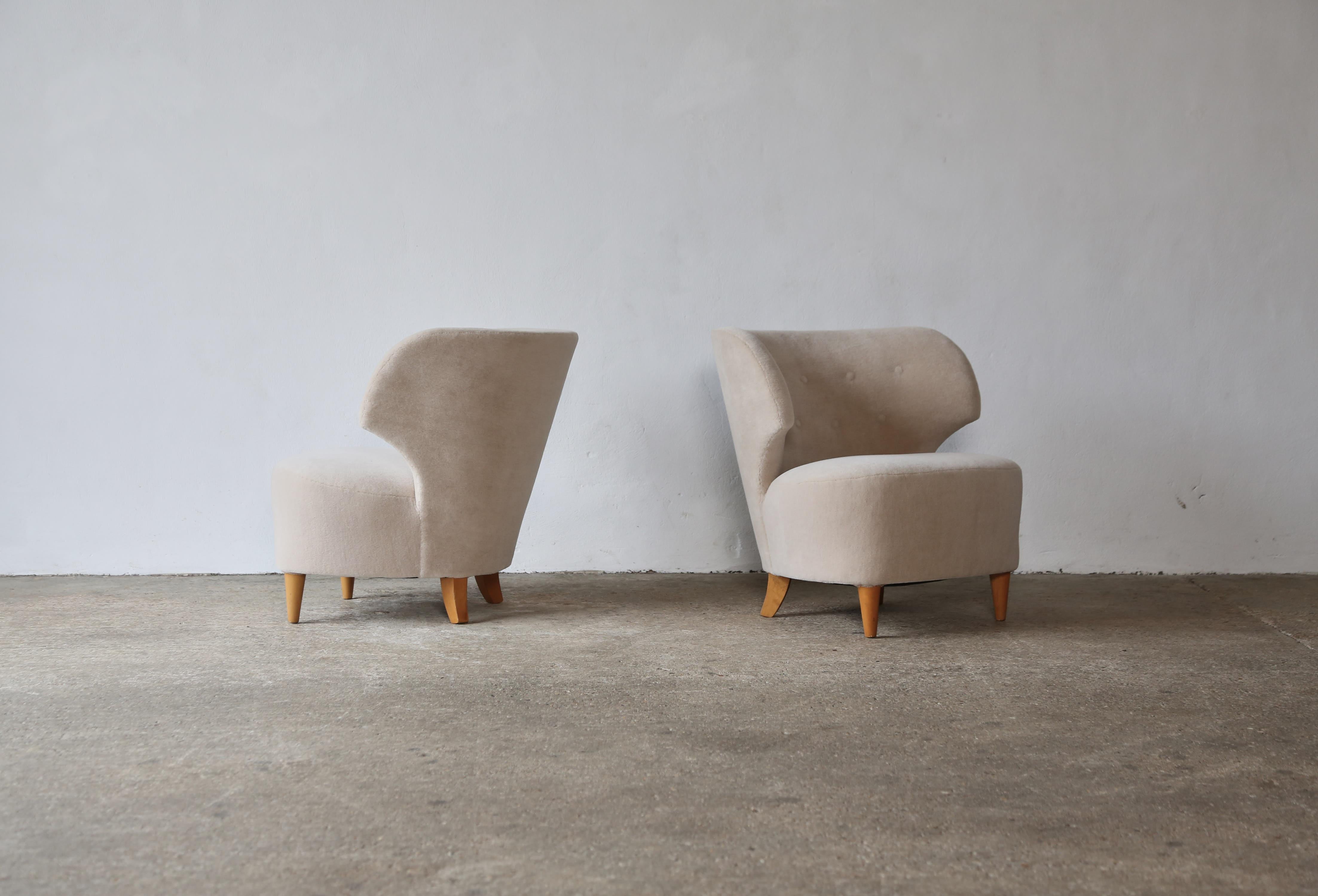 A lovely pair of Carl-Johan Boman cocktail / easy chairs, Finland, 1940s.  Newly upholstered in a premium pure Alpaca wool.  Fast shipping worldwide.





