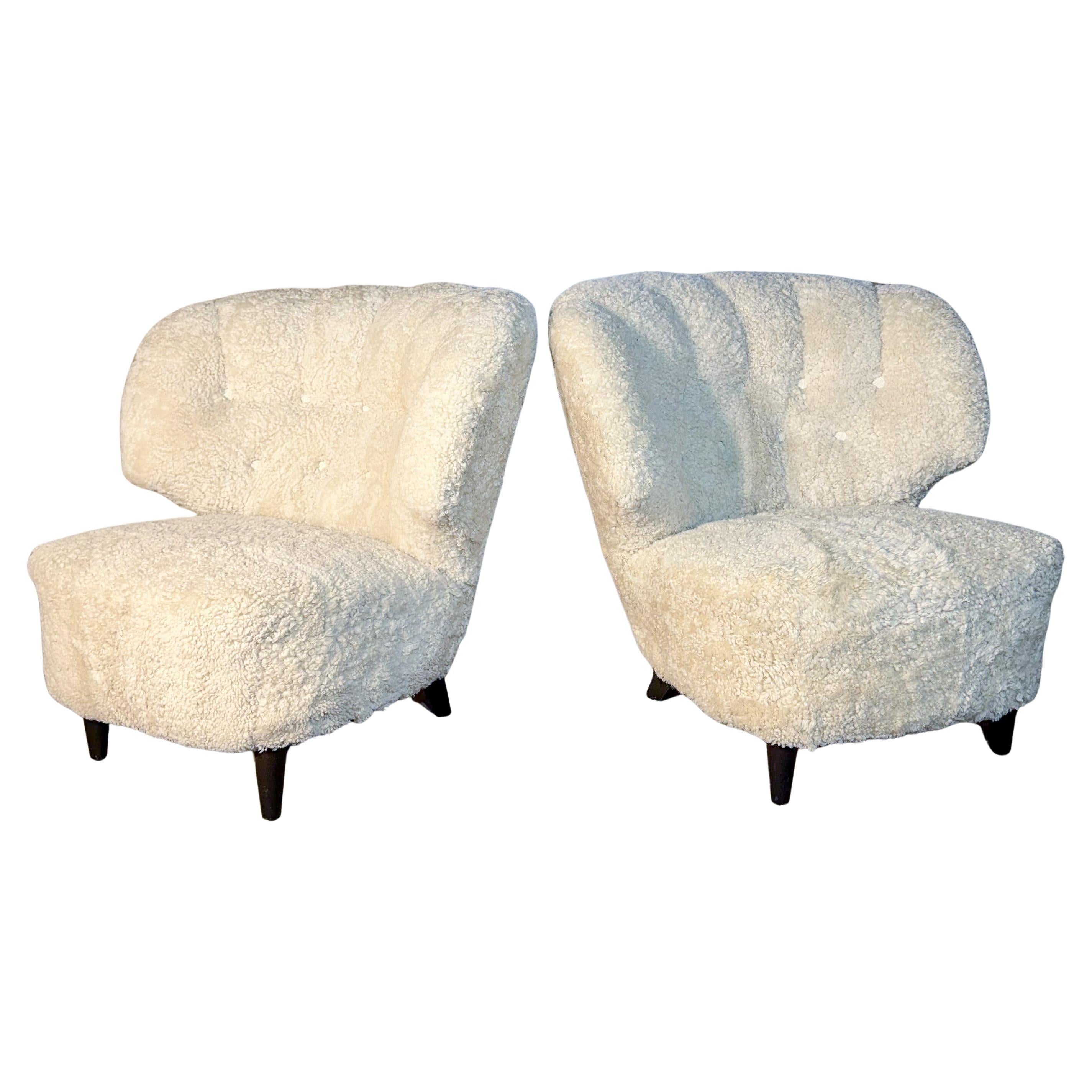 Pair of Carl-Johan Boman Lounge Chairs in Sheepskin, Finland, 1930s