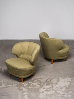 Pair of Carl-Johan Boman Lounge Chairs with Sculpted Back, Finland, 1940s