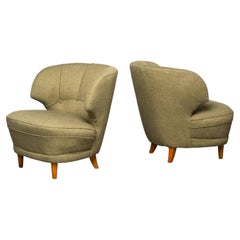 Pair of Carl-Johan Boman Lounge Chairs with Sculpted Back, Finland, 1940s