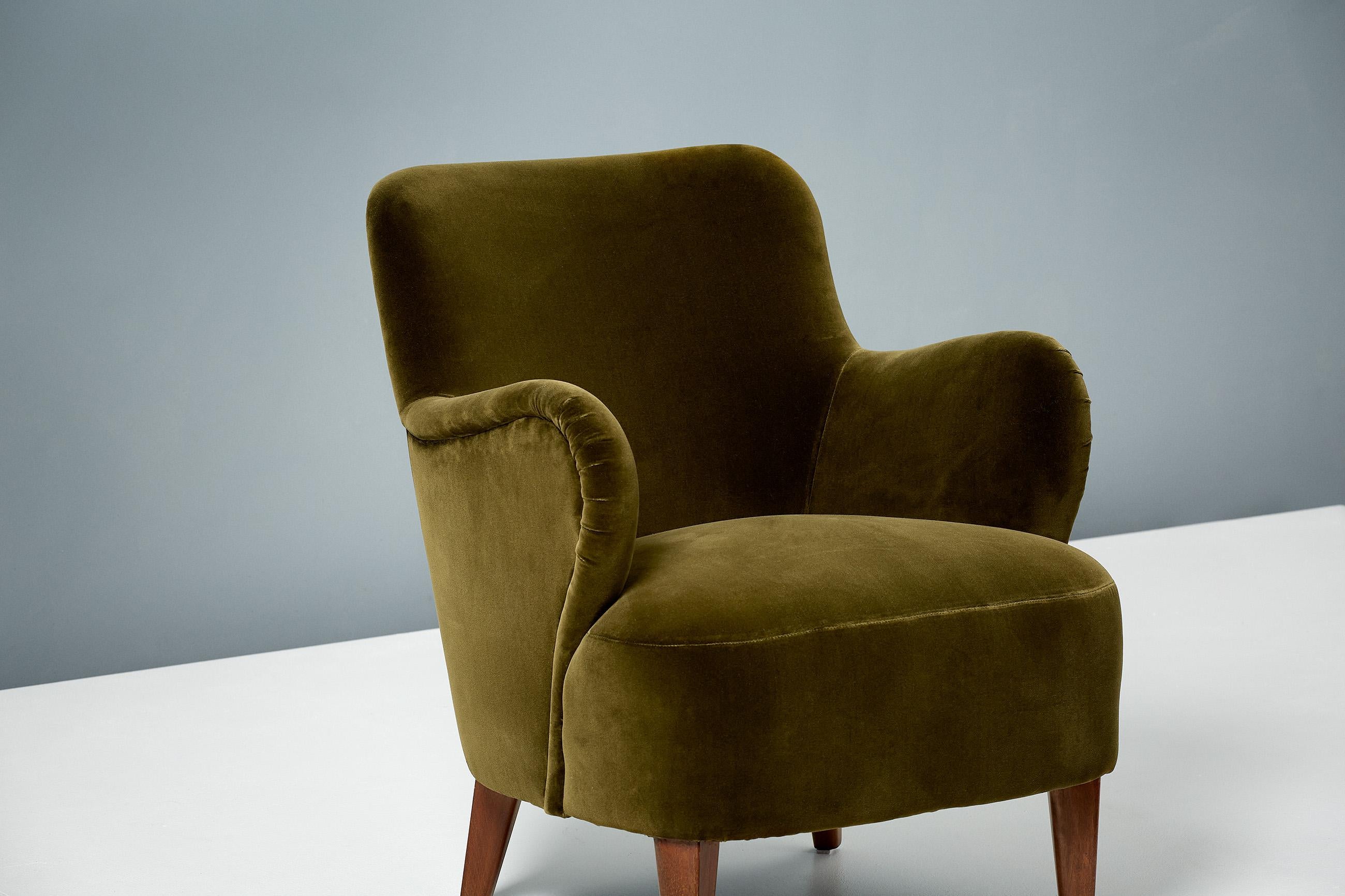 A pair of armchairs designed by Carl Malmsten in 1950s and produced in Sweden. This pair have been reupholstered in Rose Uniacke's 'Moss' deep green cotton velvet. The legs are stained elm wood.

